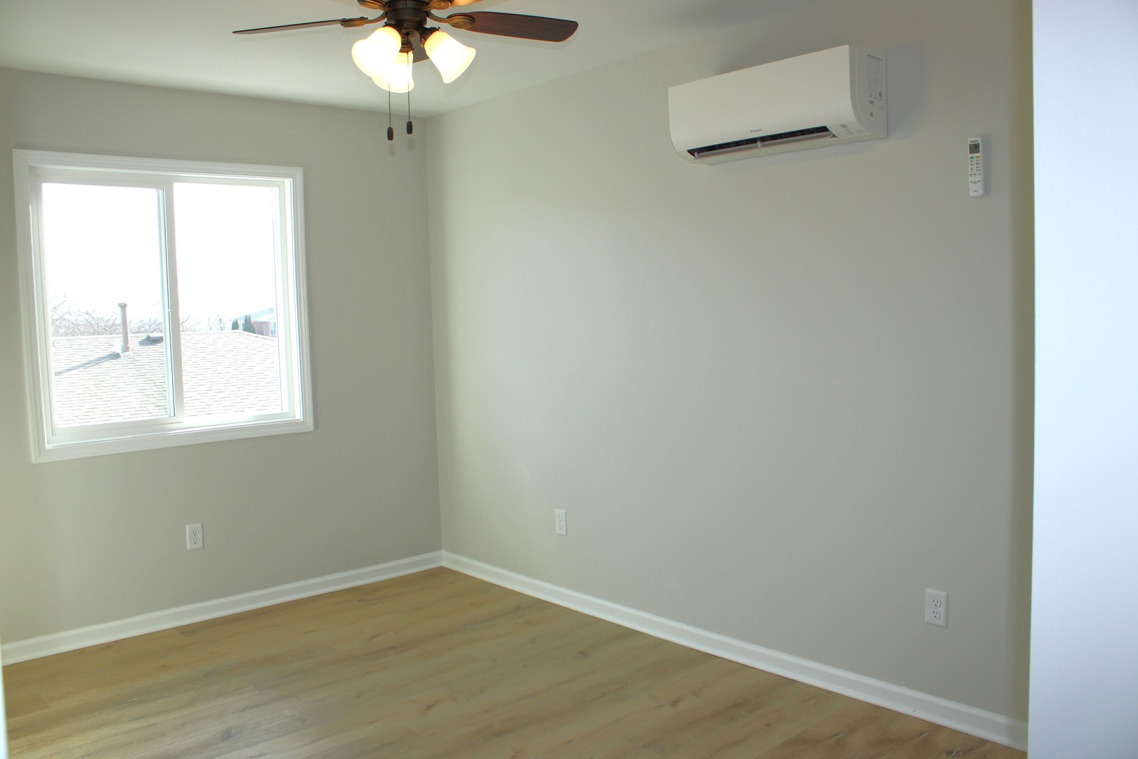 107 East Division Street, Unit 107 Manteno, IL 60950 - Photo 11 of 13 an empty room with a window