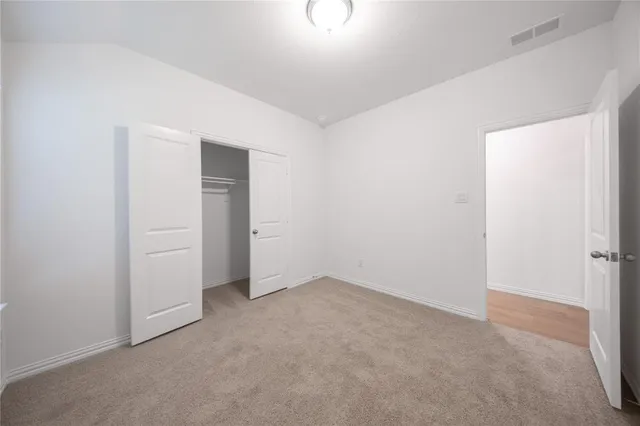 an empty room with closet