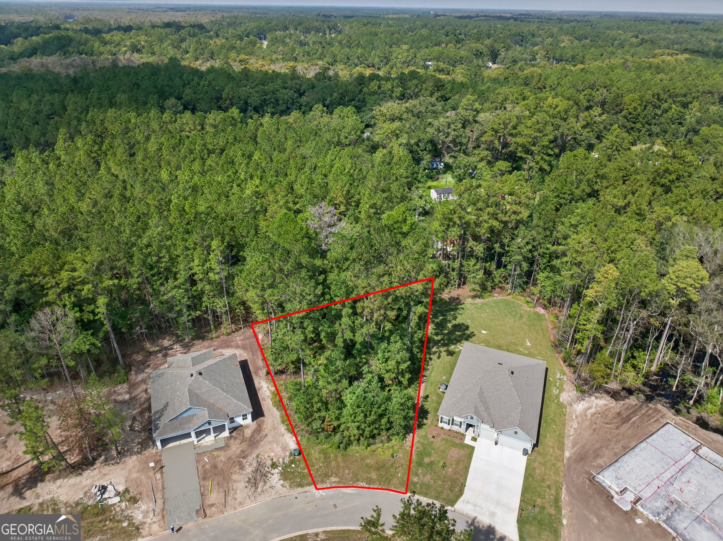 635 Breakwater Loop Kingsland, GA 31548 - Photo 1 of 26 an aerial view of a house with a yard