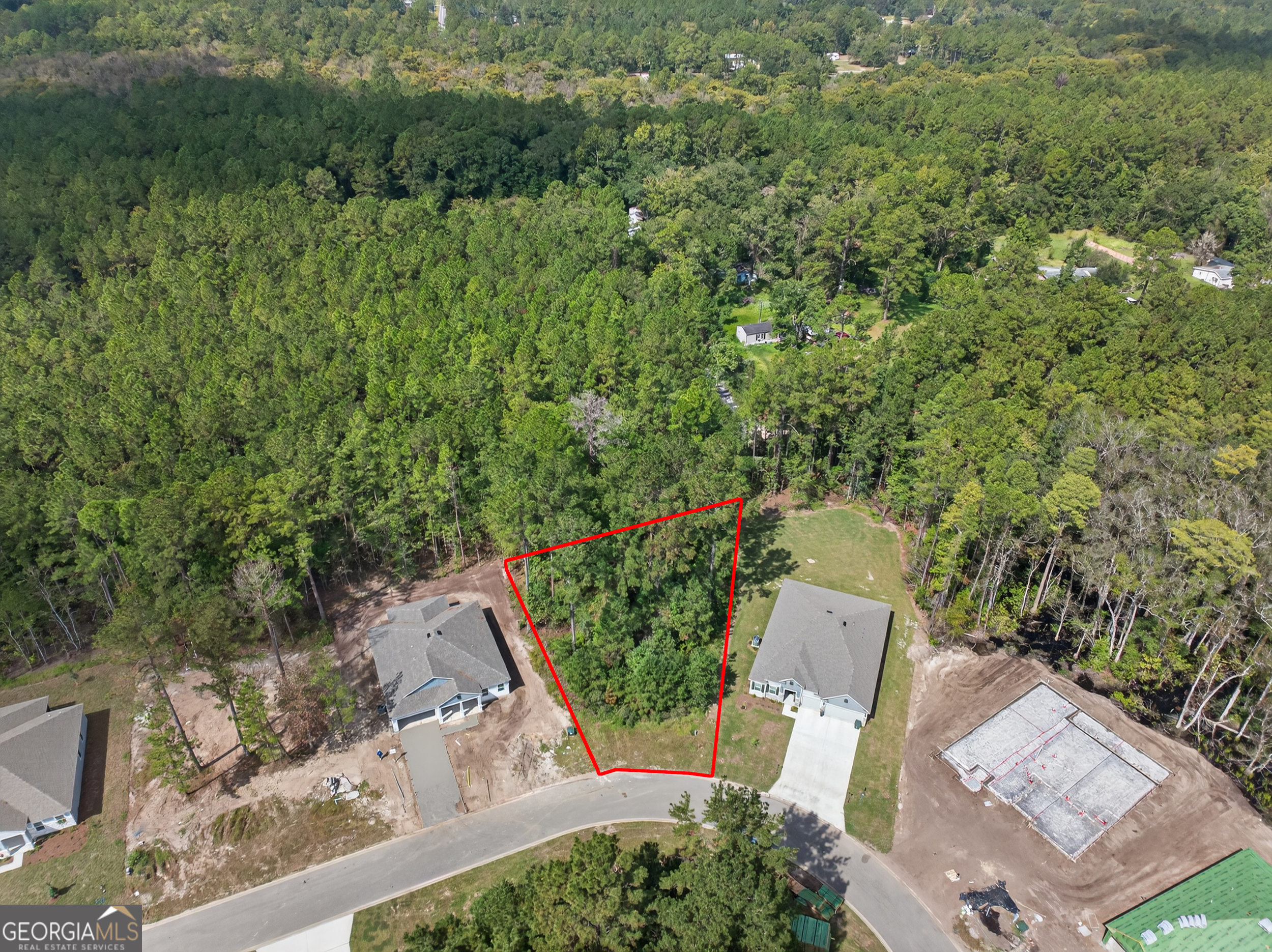 635 Breakwater Loop Kingsland, GA 31548 - Photo 2 of 26 an aerial view of a house with a yard and outdoor seating