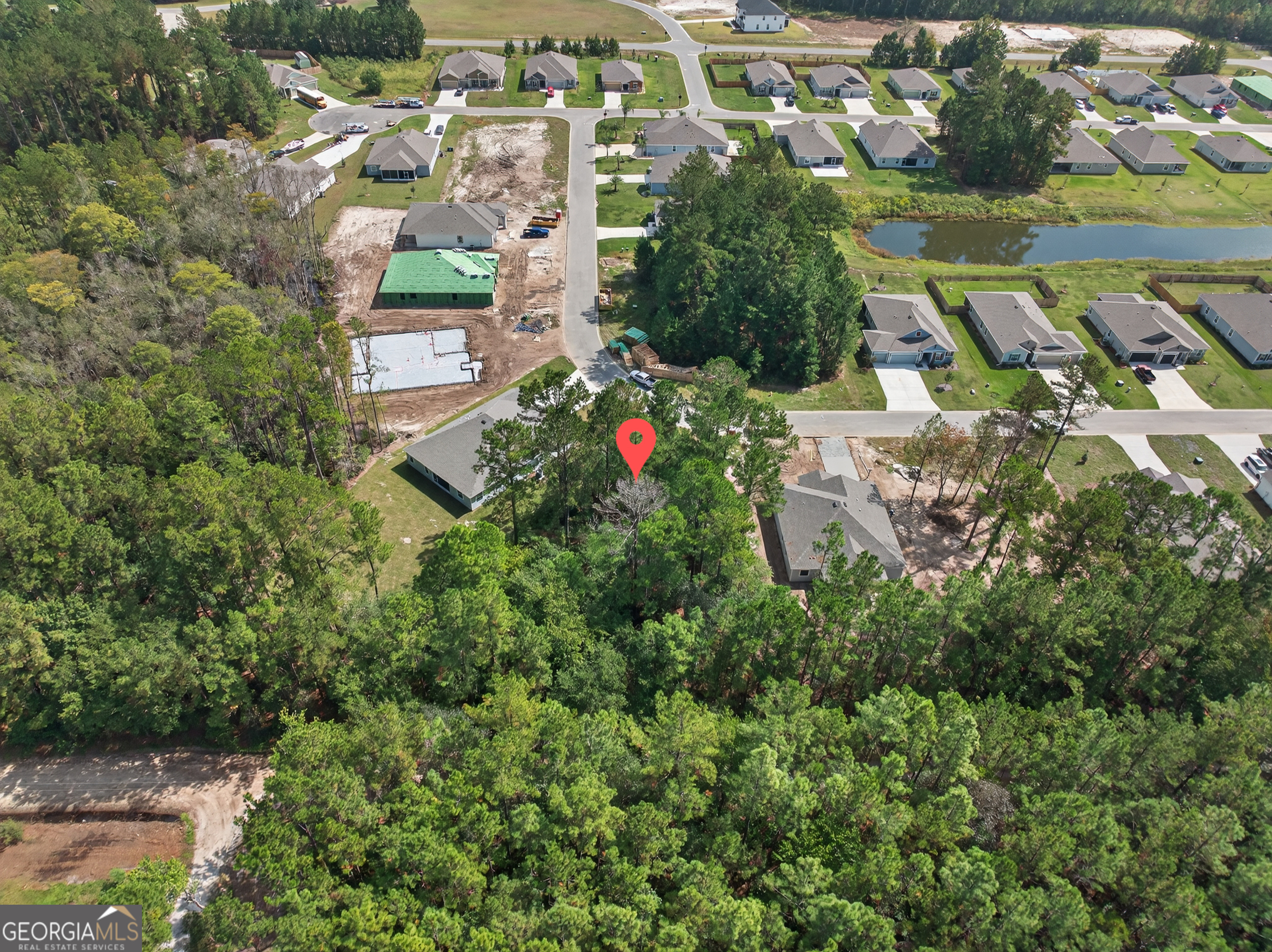 635 Breakwater Loop Kingsland, GA 31548 - Photo 4 of 26 an aerial view of residential building and lake