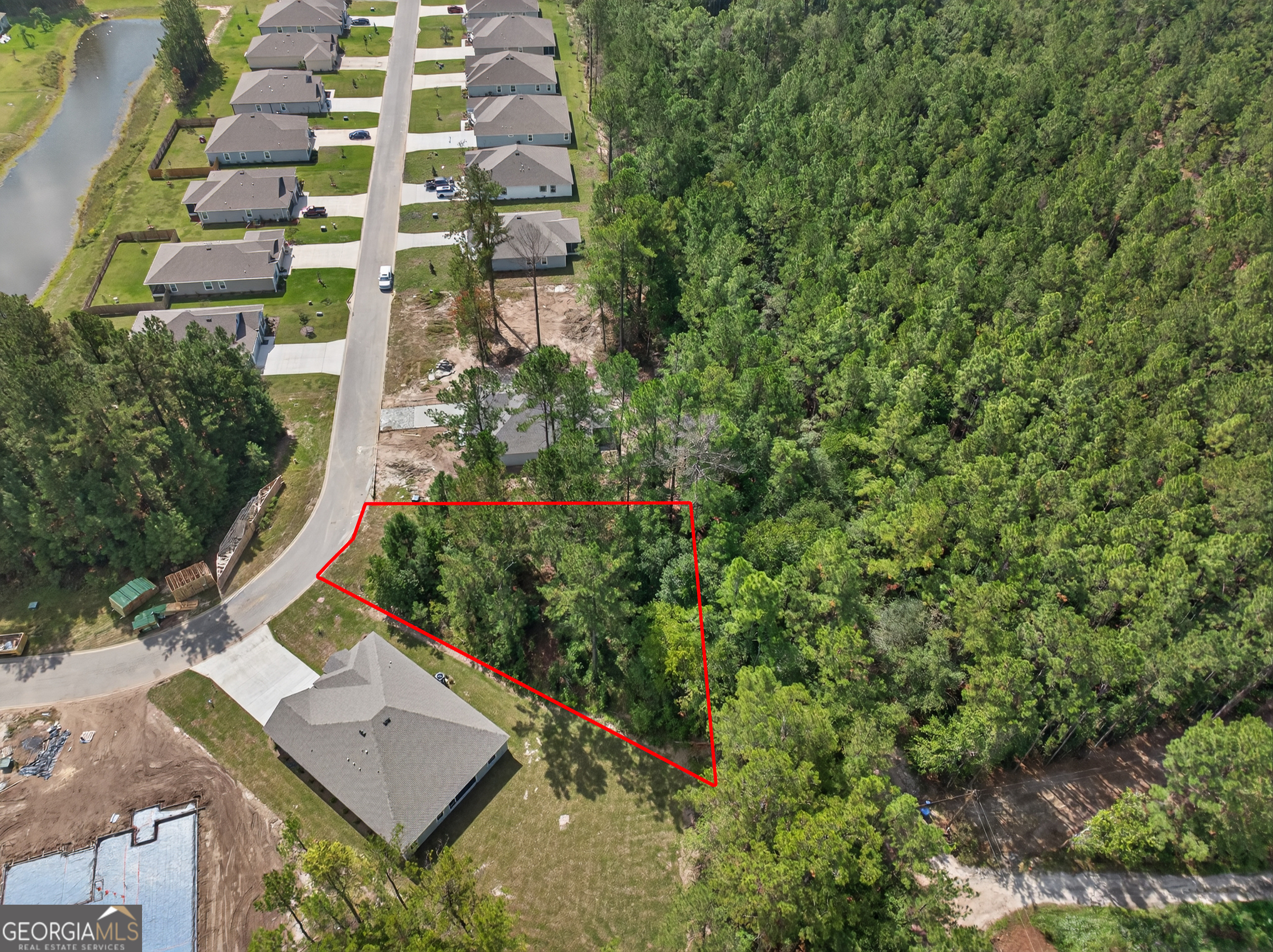 635 Breakwater Loop Kingsland, GA 31548 - Photo 5 of 26 a view of building with yard
