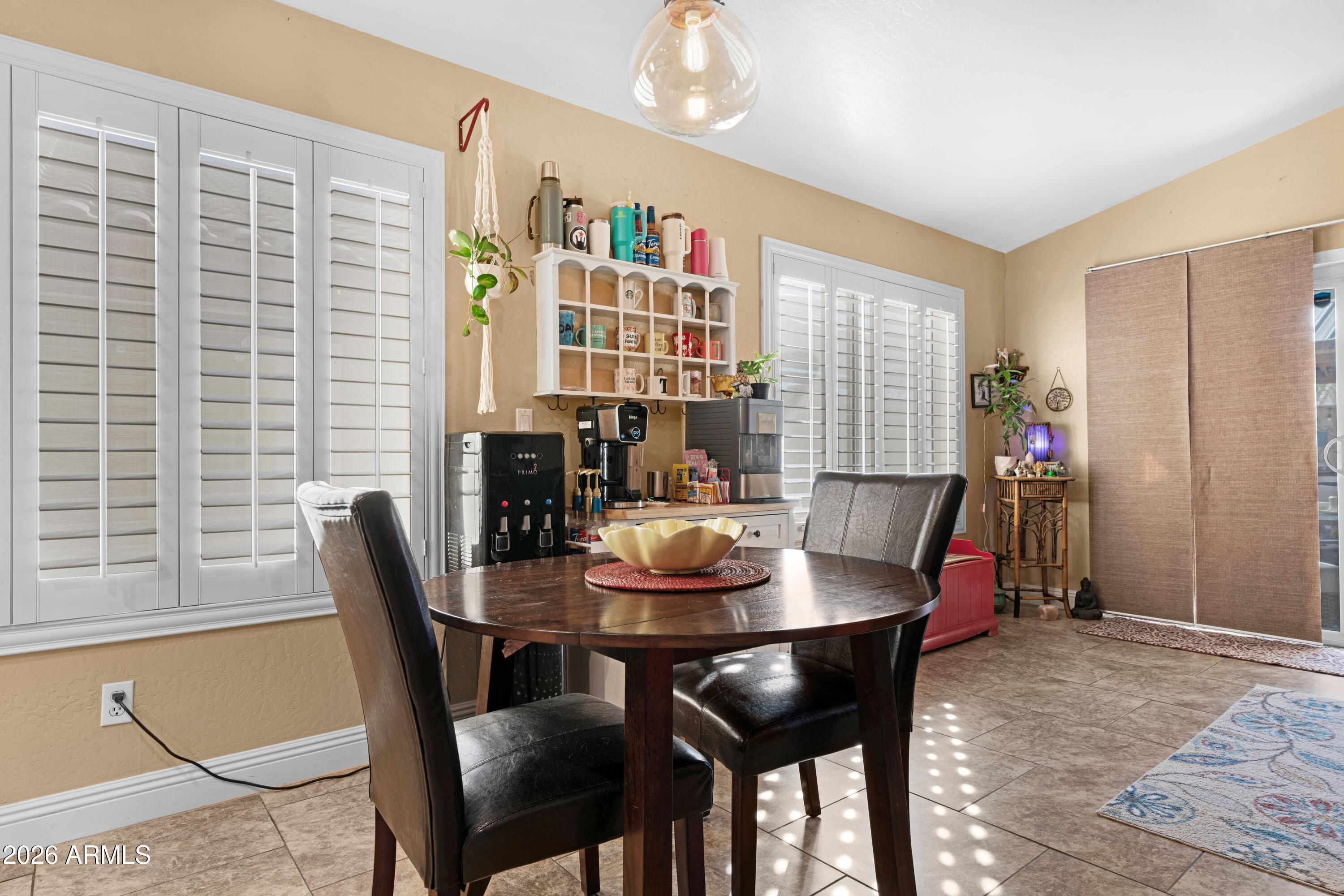 1513 West Shellfish Drive Gilbert, AZ 85233 - Photo 14 of 35 a dining room with furniture and window