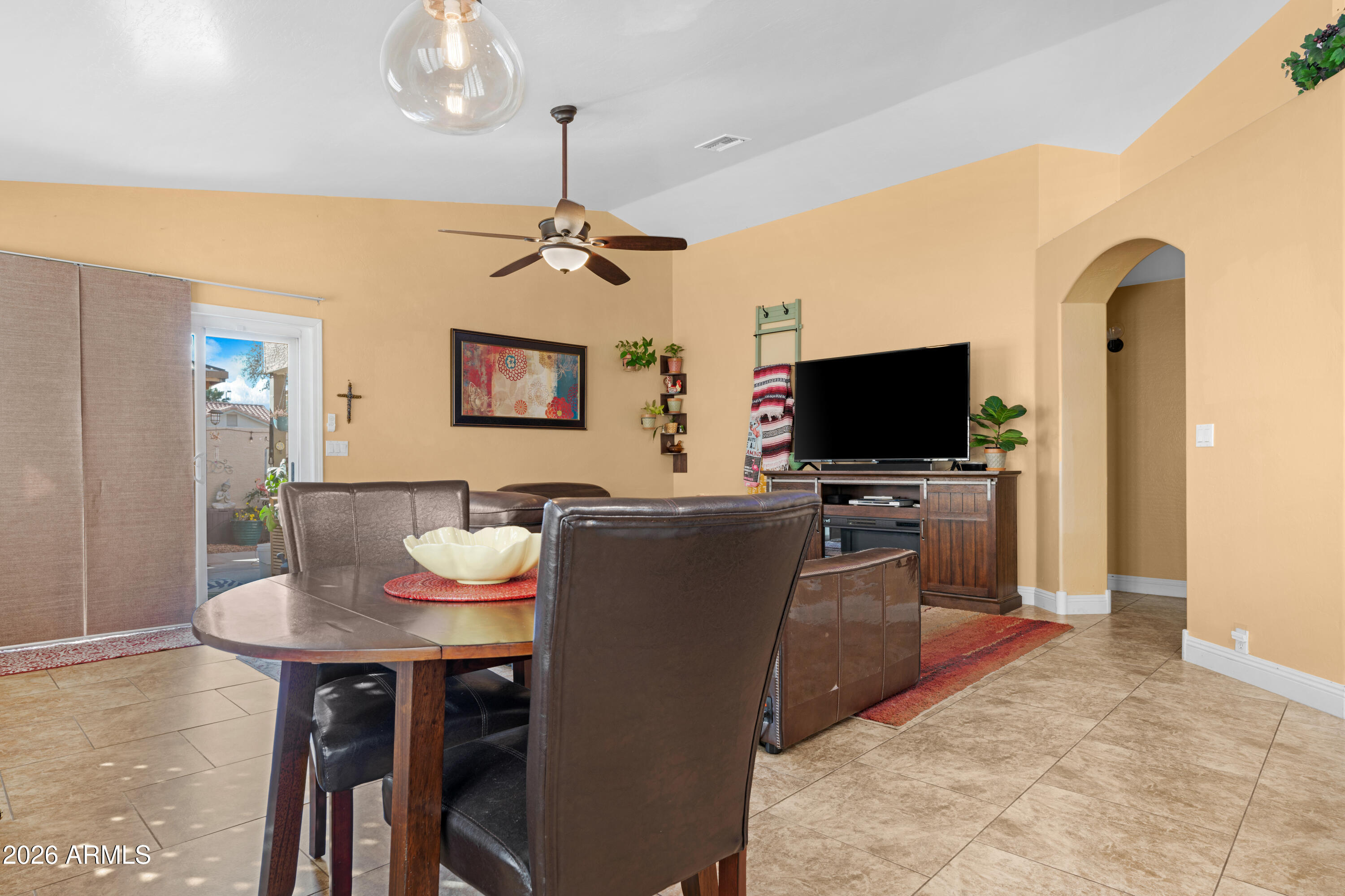 1513 West Shellfish Drive Gilbert, AZ 85233 - Photo 15 of 35 a living room with furniture and a flat screen tv