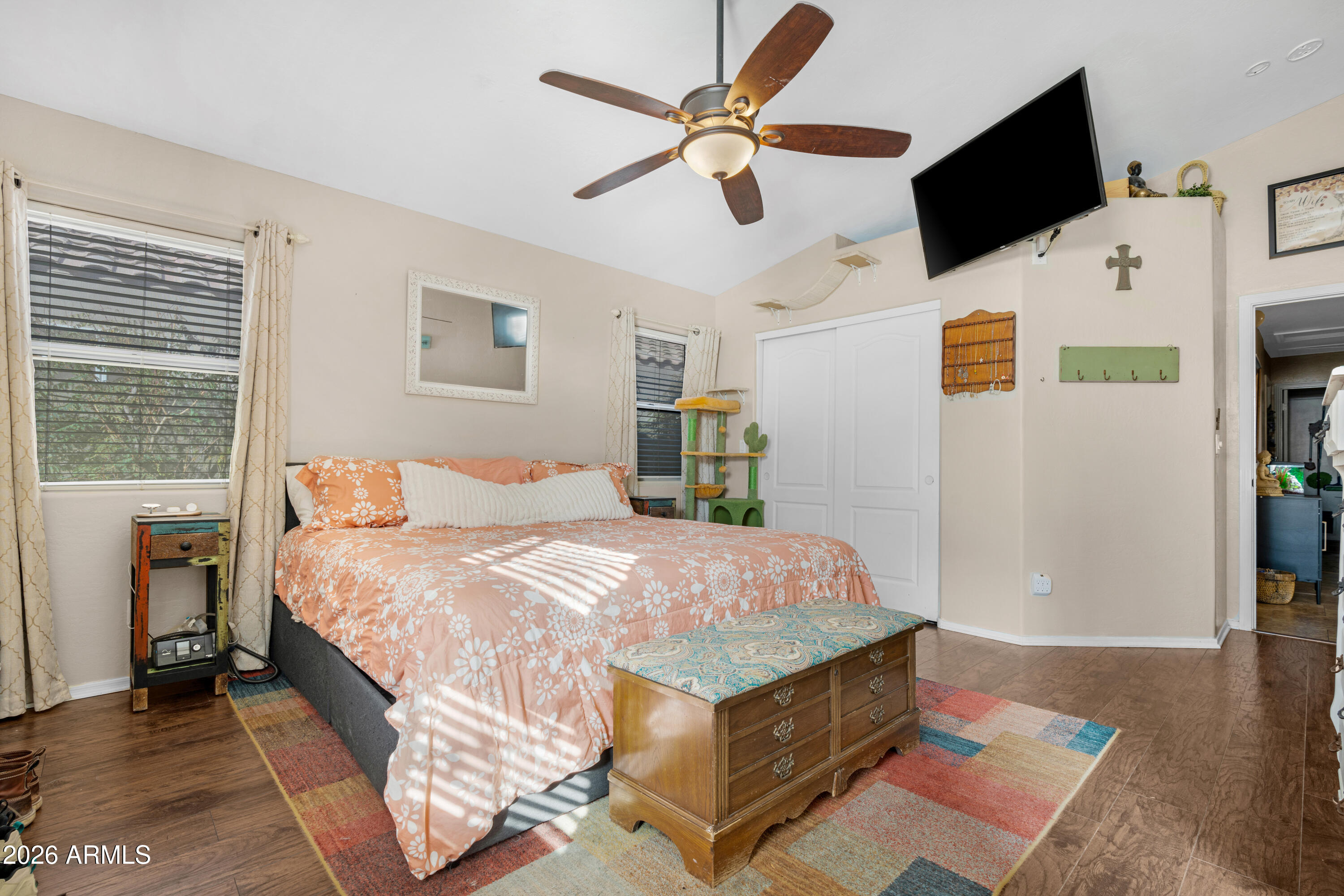 1513 West Shellfish Drive Gilbert, AZ 85233 - Photo 21 of 35 a bed room with a bed tv and a window