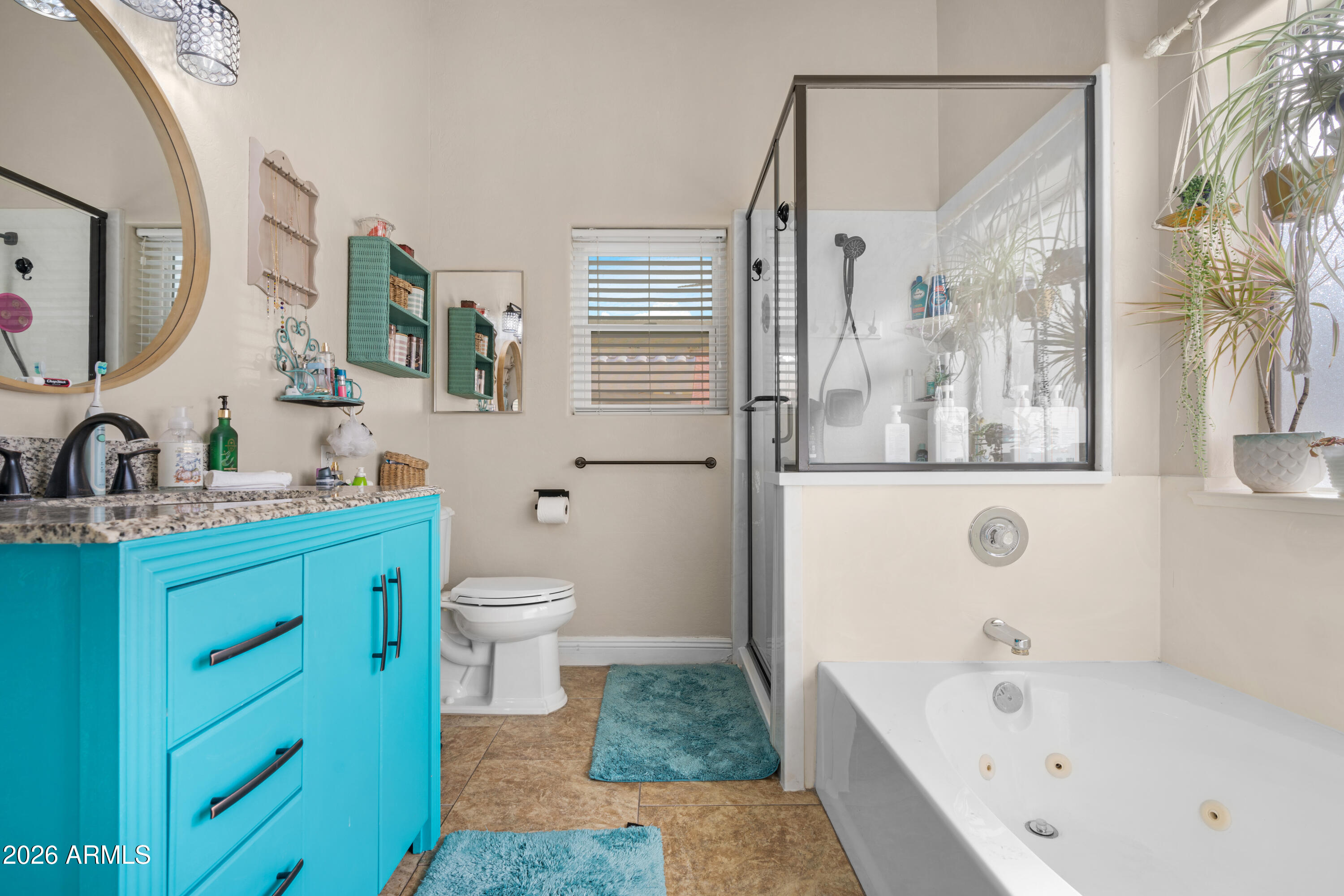 1513 West Shellfish Drive Gilbert, AZ 85233 - Photo 23 of 35 a bathroom with a granite countertop sink a toilet and a bathtub