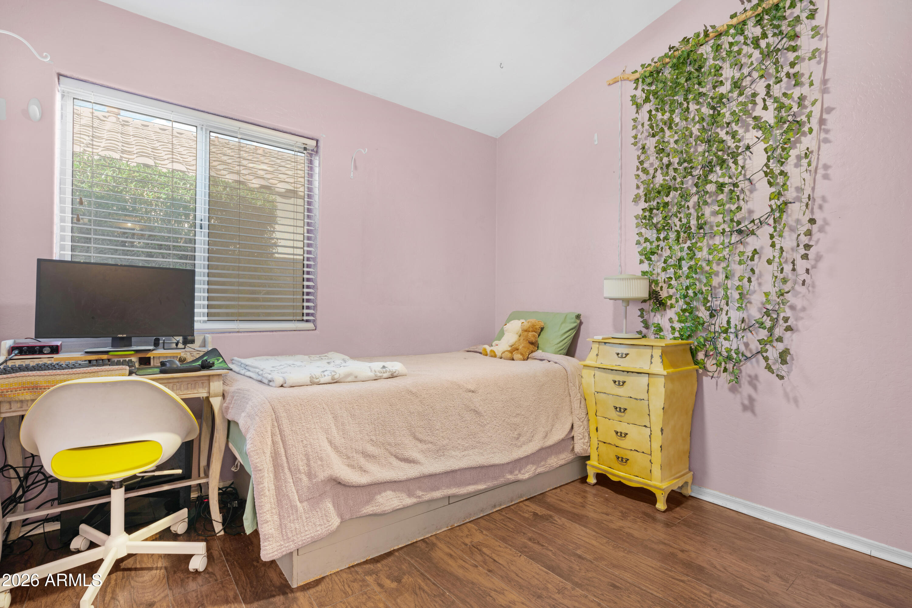 1513 West Shellfish Drive Gilbert, AZ 85233 - Photo 27 of 35 a bedroom with a bed a table and a flat screen tv