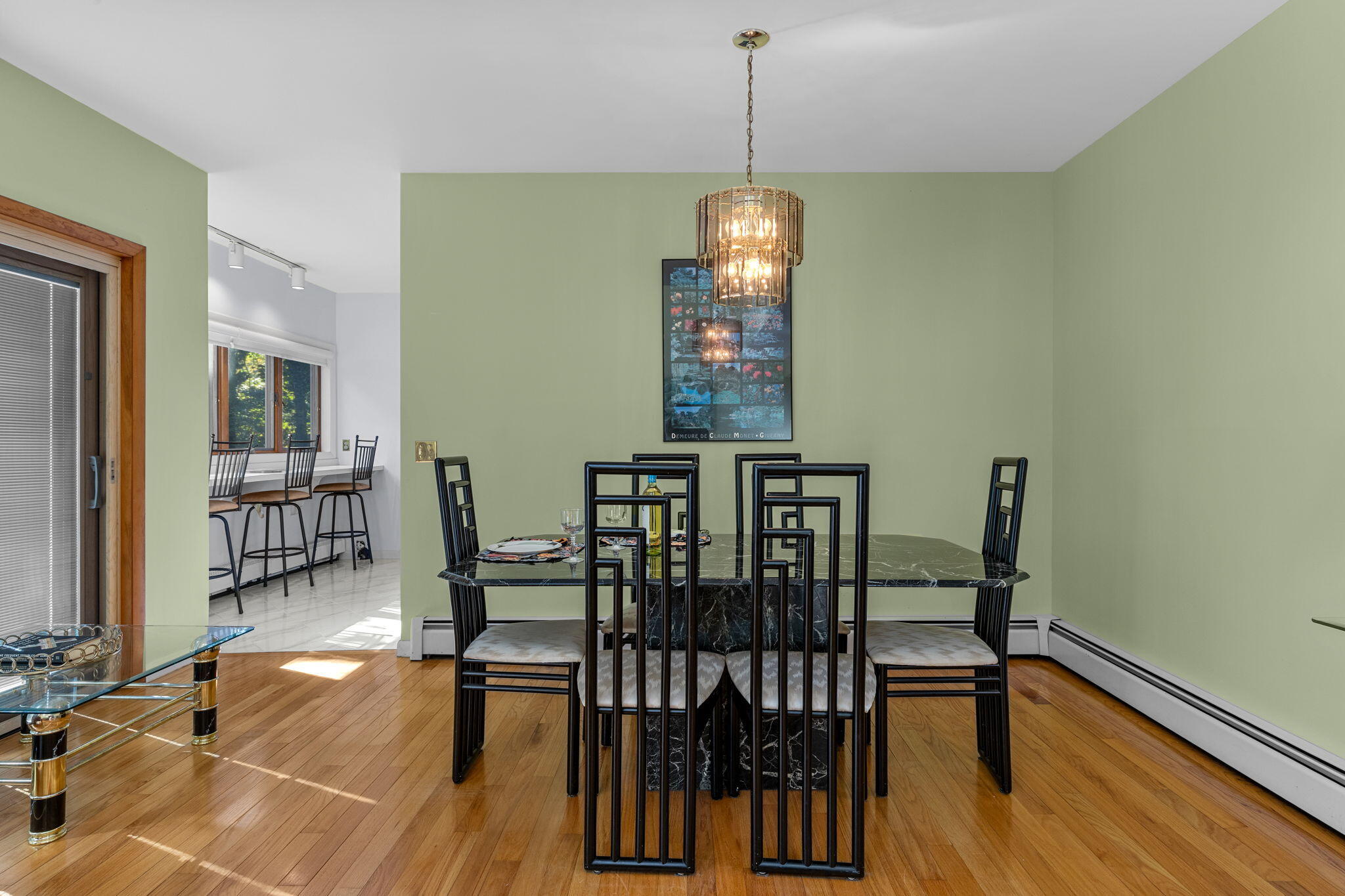 25 Twin Rocks Drive Eastham, MA 02642 - Photo 16 of 61 a view of a dining room with furniture window and wooden floor