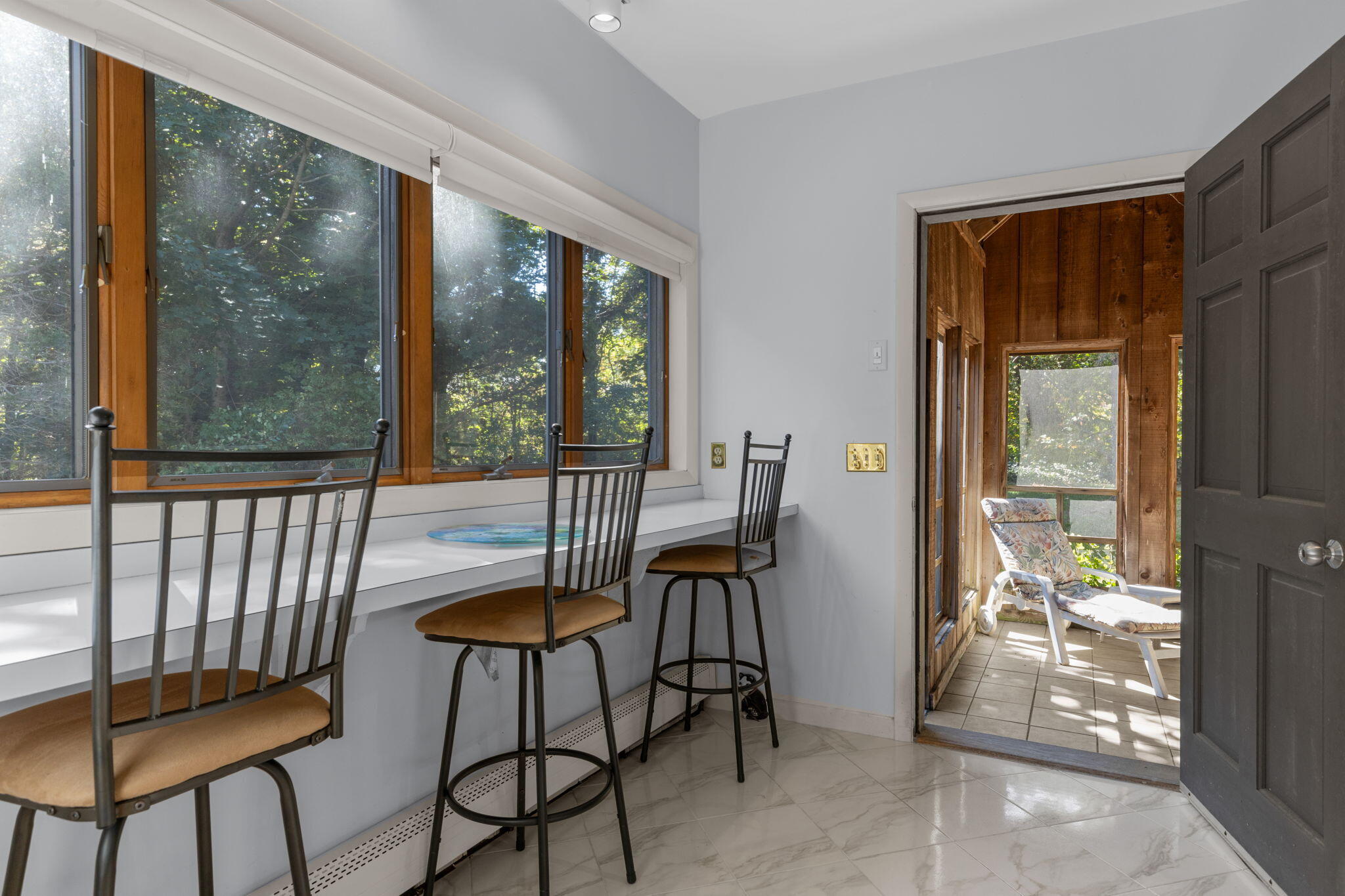 25 Twin Rocks Drive Eastham, MA 02642 - Photo 24 of 61 a view of a room with a large window and wooden floor