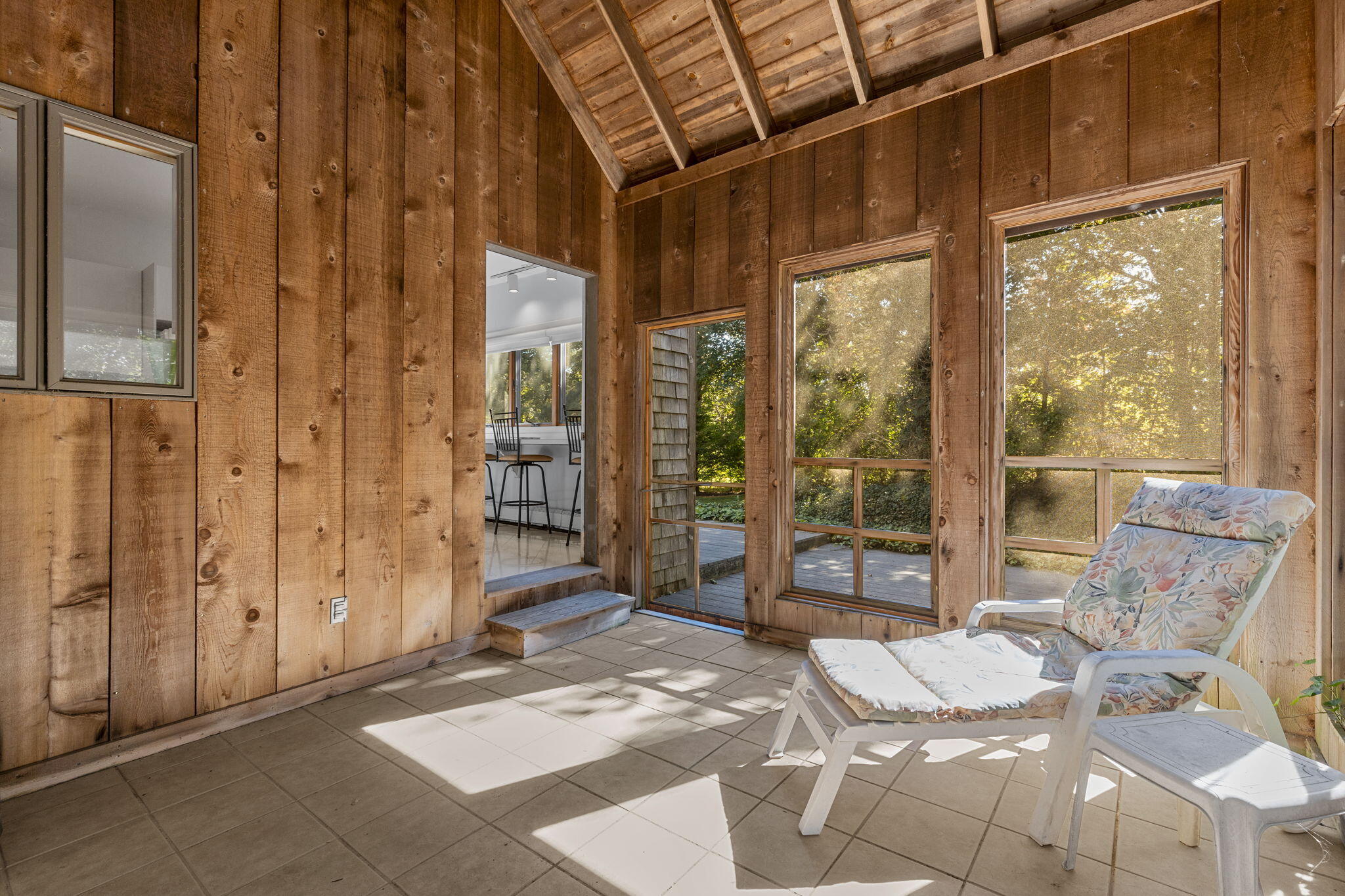 25 Twin Rocks Drive Eastham, MA 02642 - Photo 27 of 61 a living room with furniture windows and a table