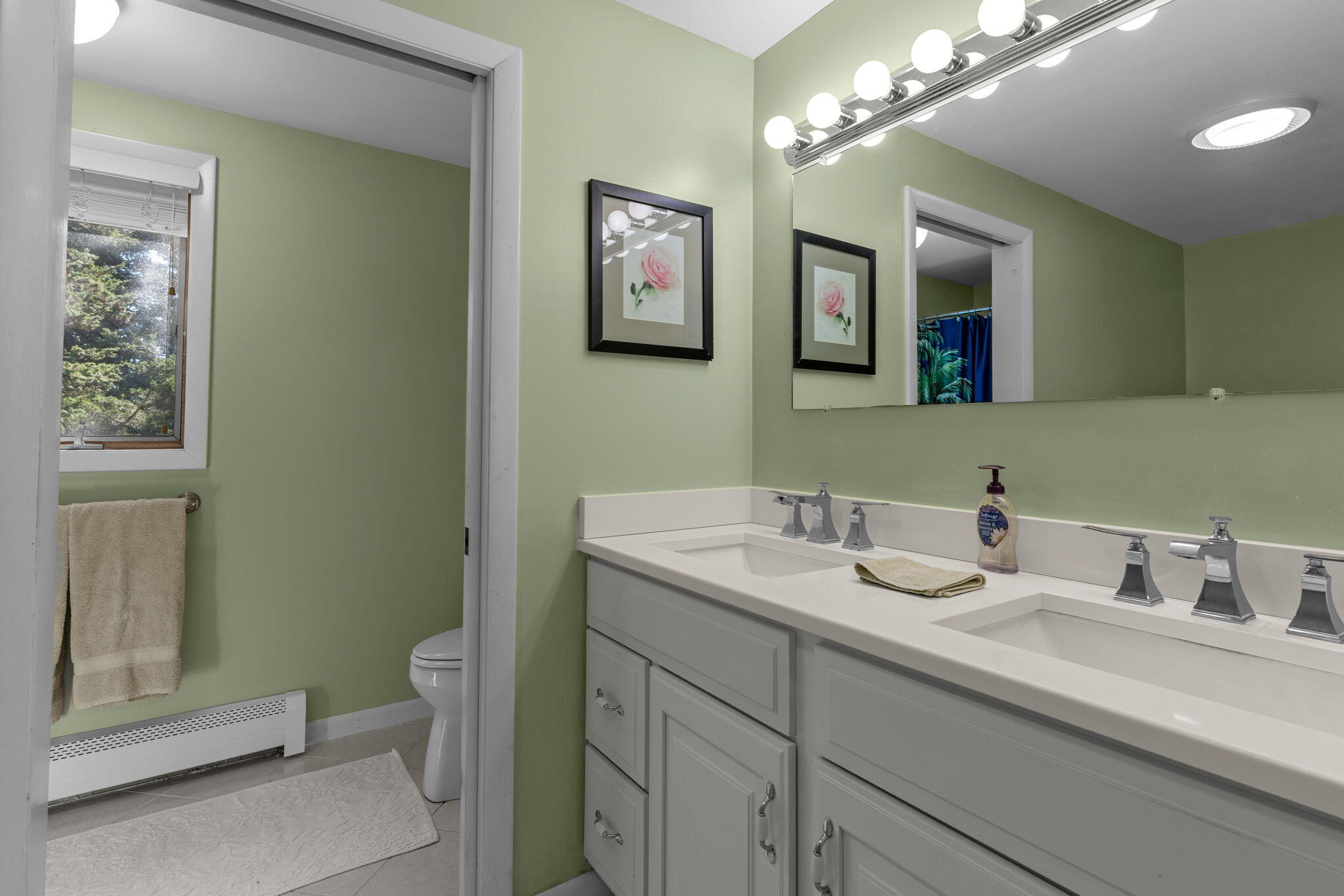 25 Twin Rocks Drive Eastham, MA 02642 - Photo 34 of 61 a bathroom with a toilet sink and mirror