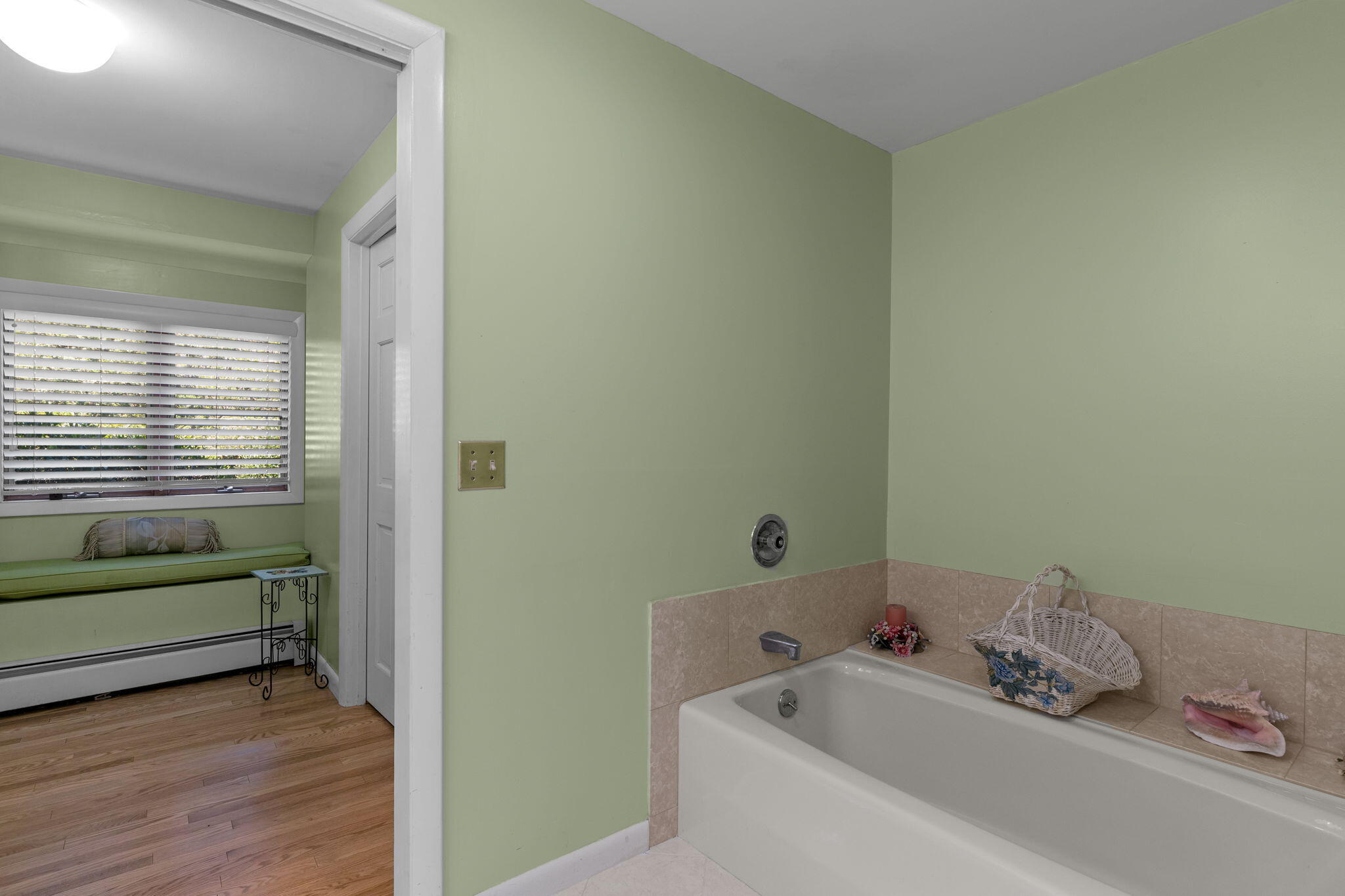 25 Twin Rocks Drive Eastham, MA 02642 - Photo 36 of 61 a bathroom with a tub a sink and a large window