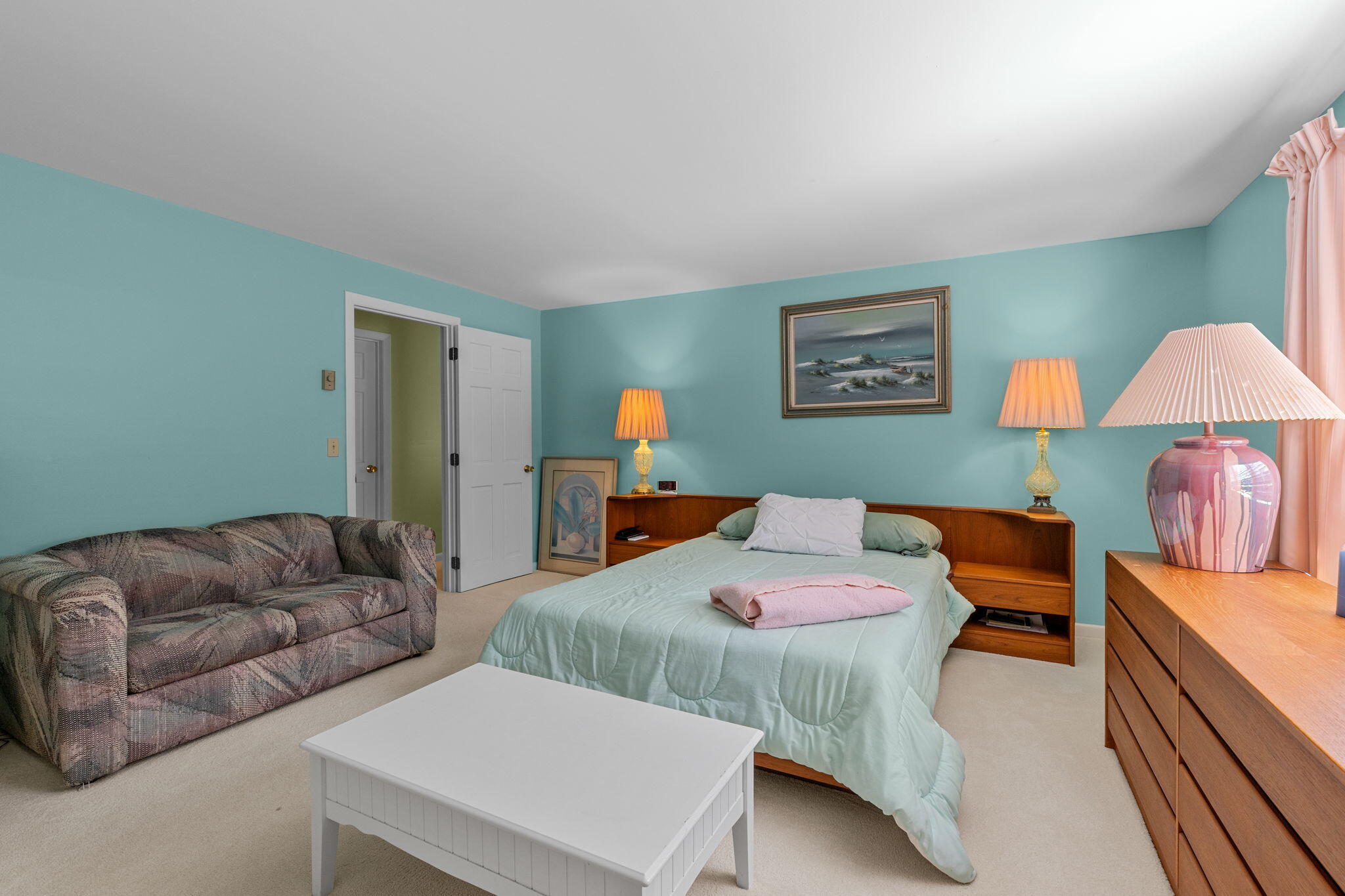 25 Twin Rocks Drive Eastham, MA 02642 - Photo 40 of 61 a bedroom with bed and a couch