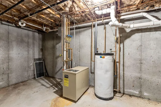 a view of a wooden door and entryway