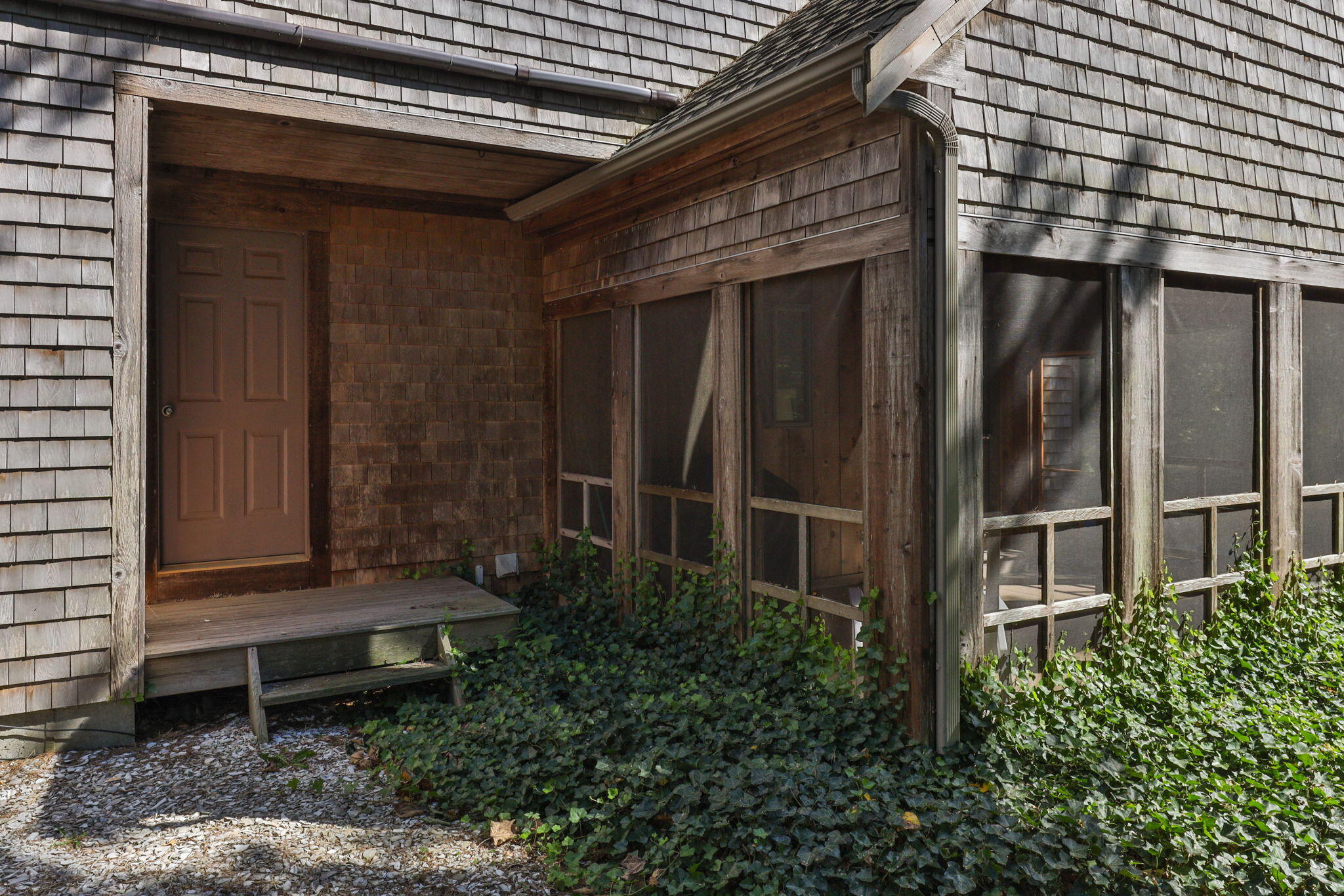 25 Twin Rocks Drive Eastham, MA 02642 - Photo 48 of 61 a backyard of a house with lots of green space