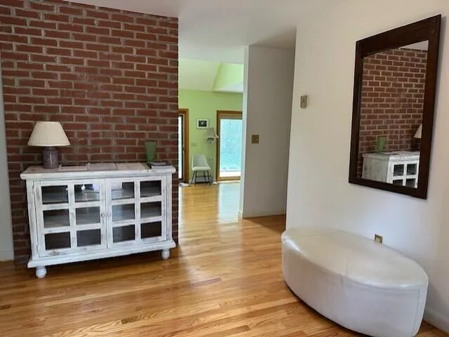 a view of a bathroom with a bathtub