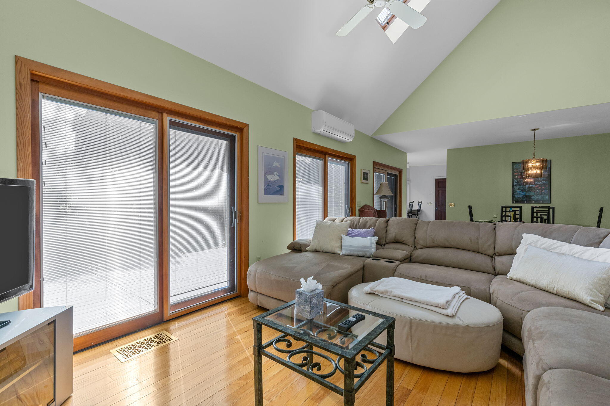 25 Twin Rocks Drive Eastham, MA 02642 - Photo 9 of 61 a living room with furniture and a flat screen tv