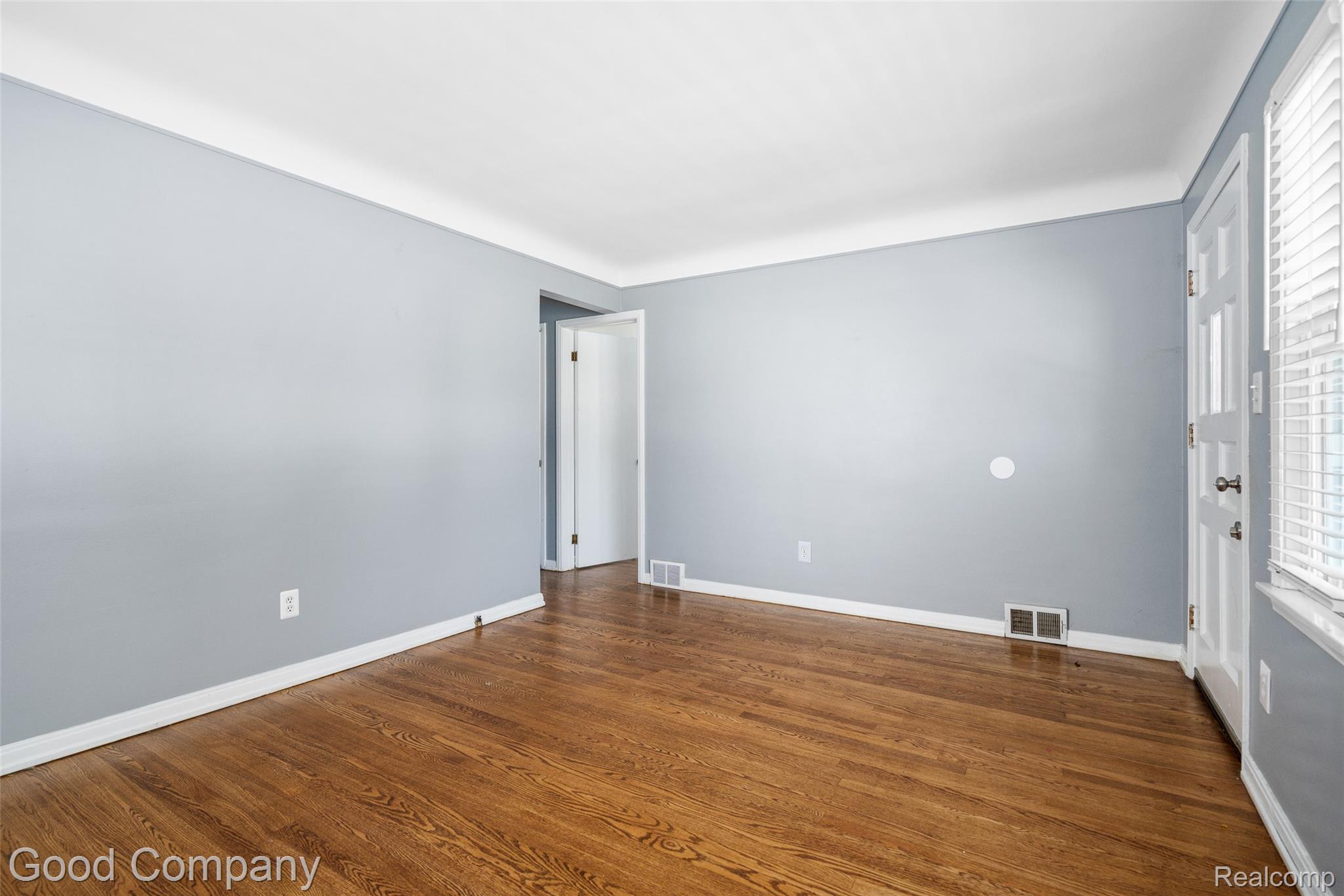 2714 South Rochester Road Royal Oak, MI 48073 - Photo 3 of 26 Living room featuring dark wood-style floors