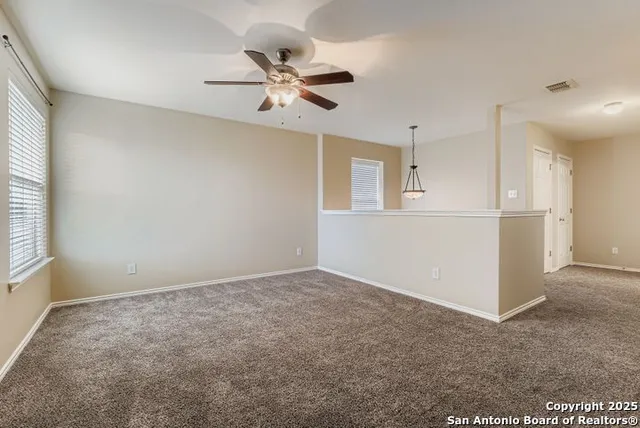 a view of an house with backyard