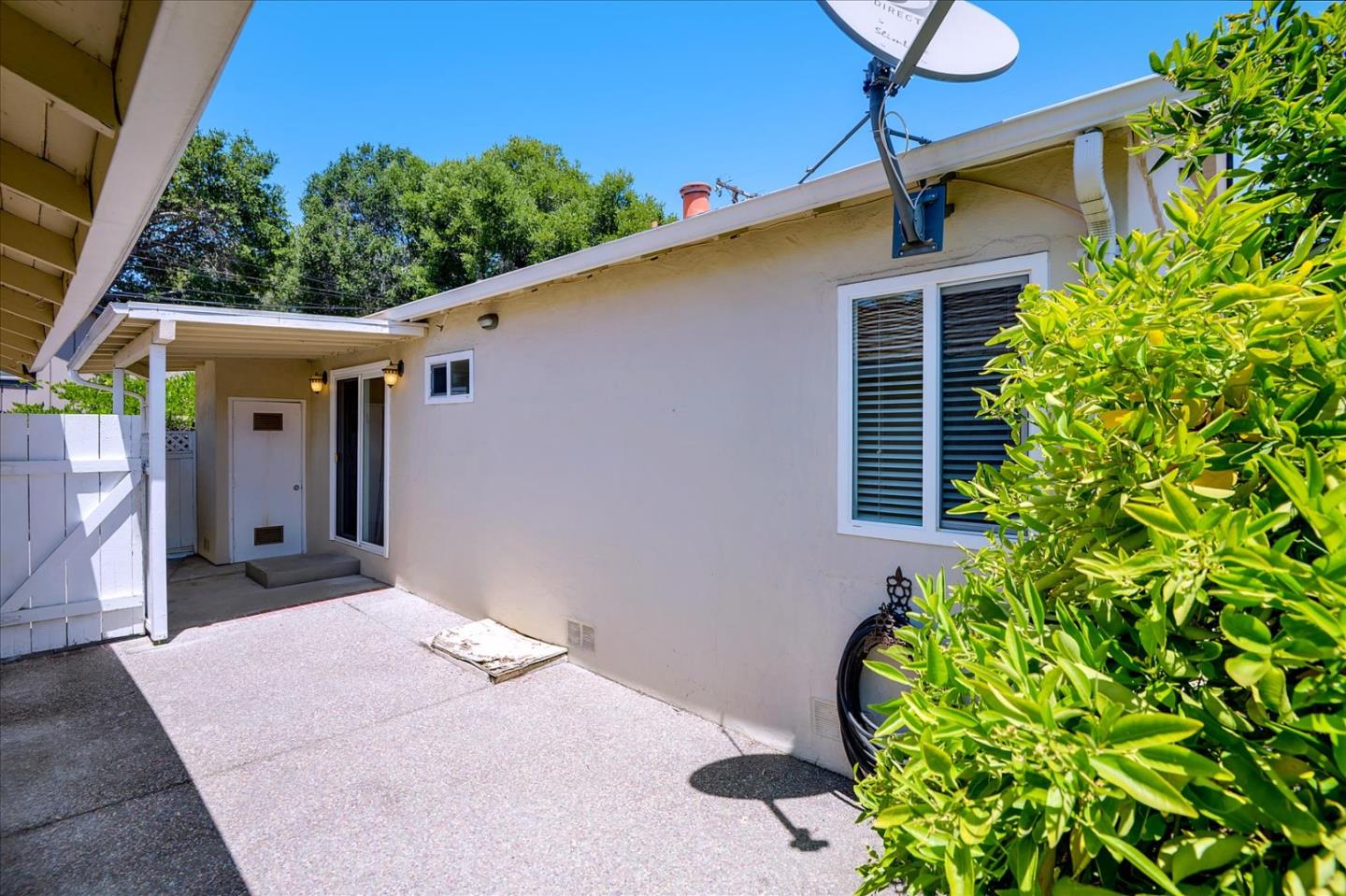 1357 Park Drive, Unit C Mountain View, CA 94040 - Photo 16 of 17 a backyard of a house with plants and trees
