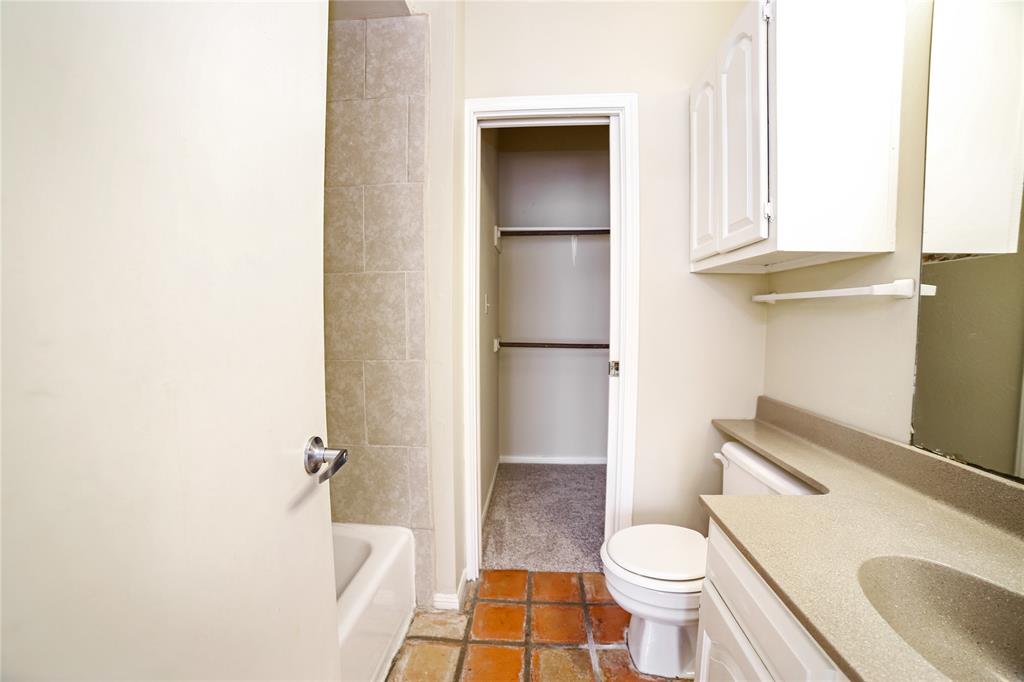 1910 Robbins Place, Unit 208 Austin, TX 78705 - Photo 7 of 9 a bathroom with a sink toilet and shower