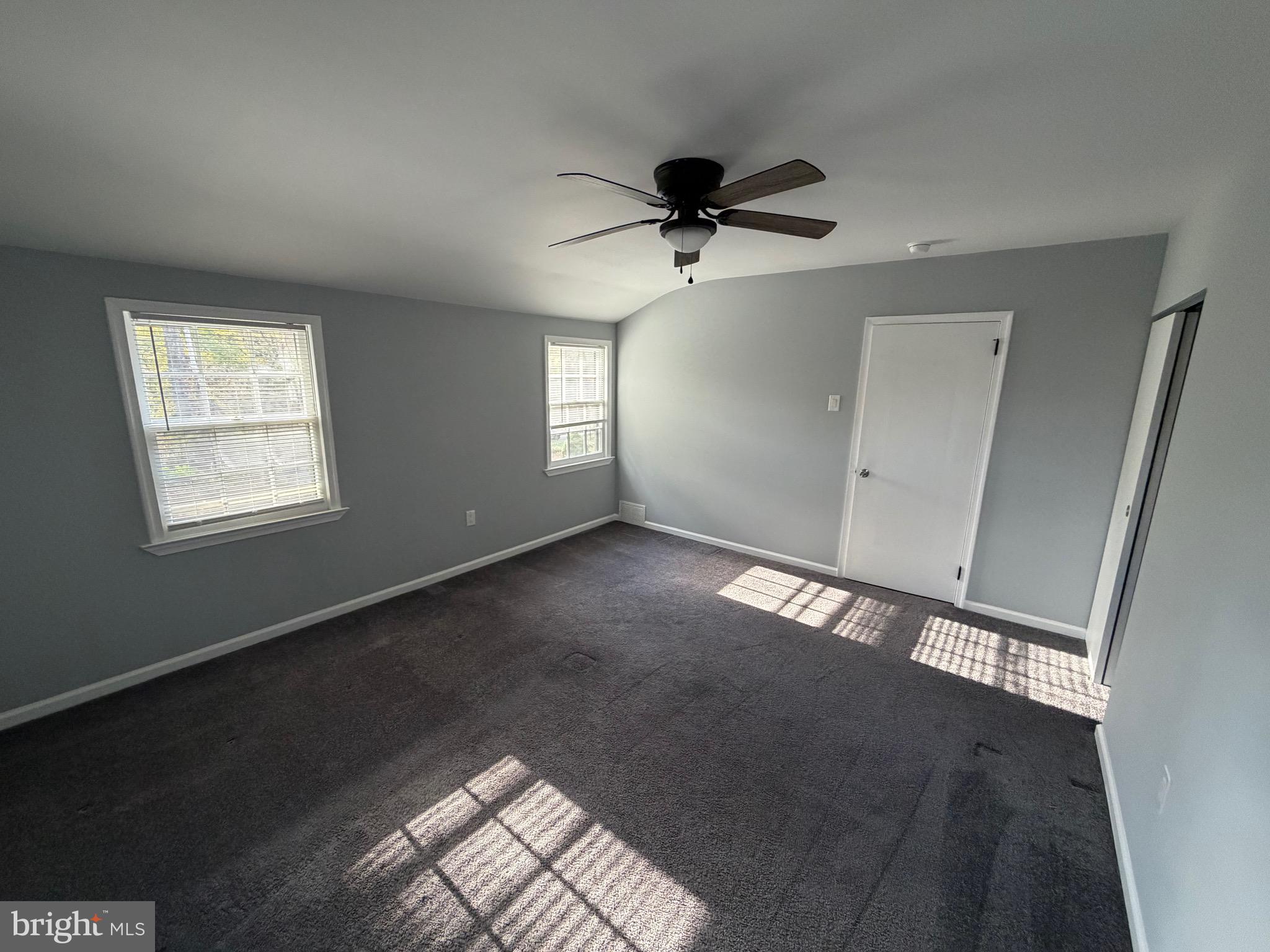 687 Bristol Road Southampton, PA 18966 - Photo 11 of 22 a view of empty room with wooden floor and fan
