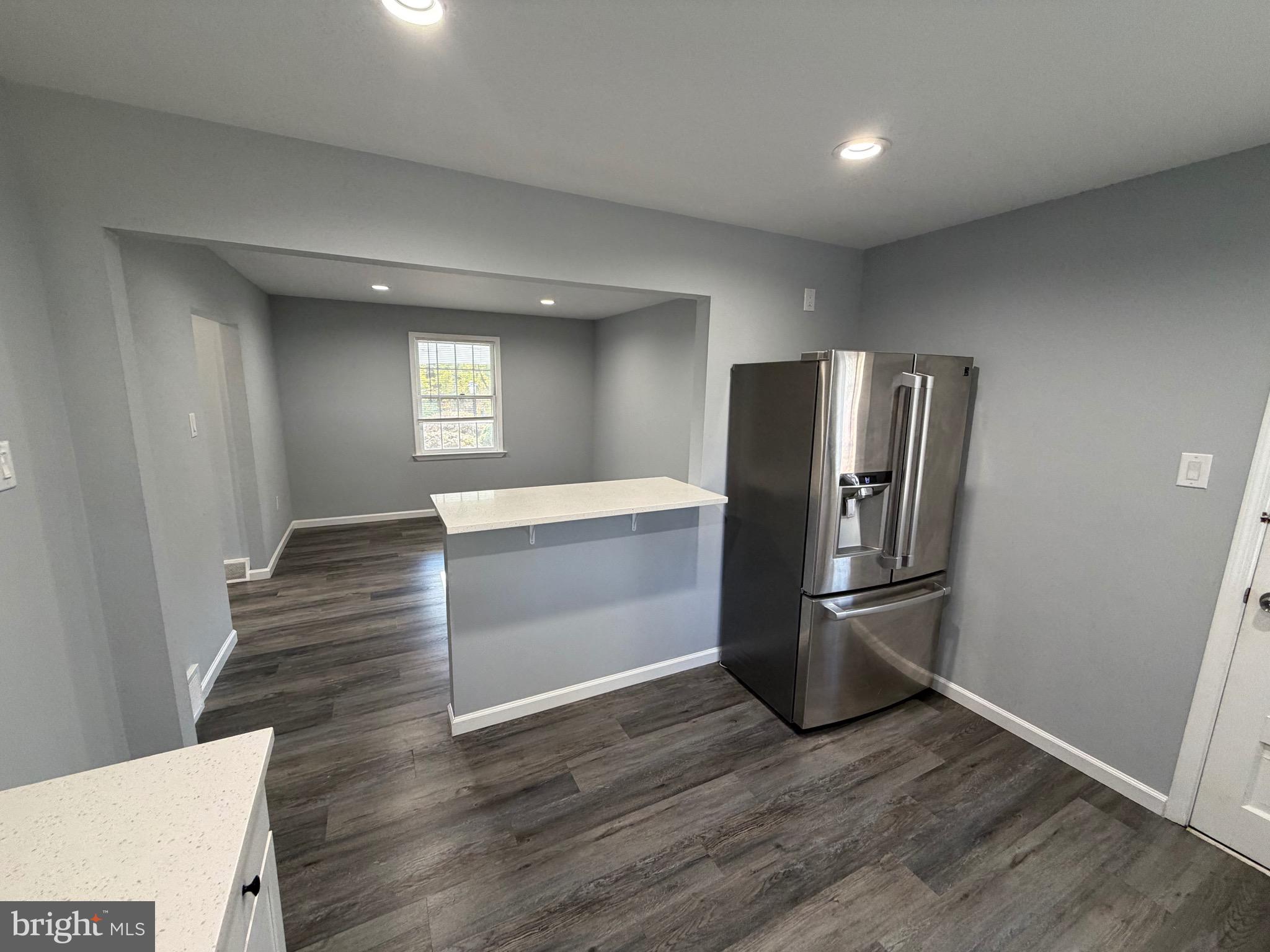 687 Bristol Road Southampton, PA 18966 - Photo 5 of 22 a view of kitchen with furniture and wooden floor