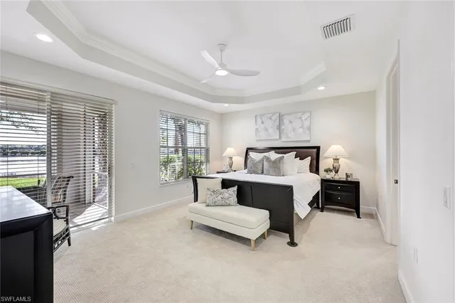 a bed room with furniture and a window