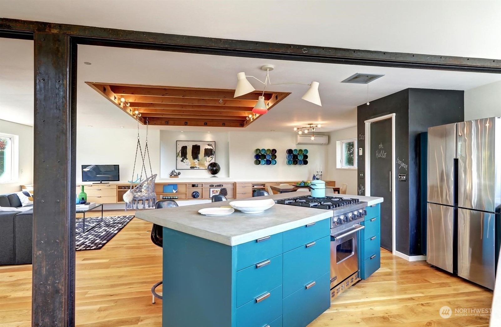 4606 Whitman Avenue North Seattle, WA 98103 - Photo 12 of 40 a kitchen with a sink stove and refrigerator
