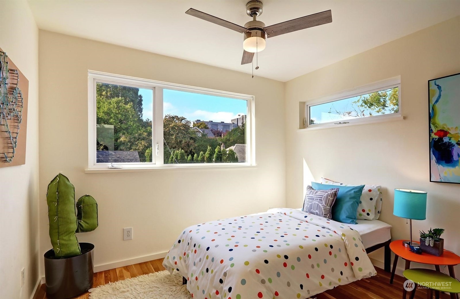 4606 Whitman Avenue North Seattle, WA 98103 - Photo 22 of 40 a bedroom with a bed and a window