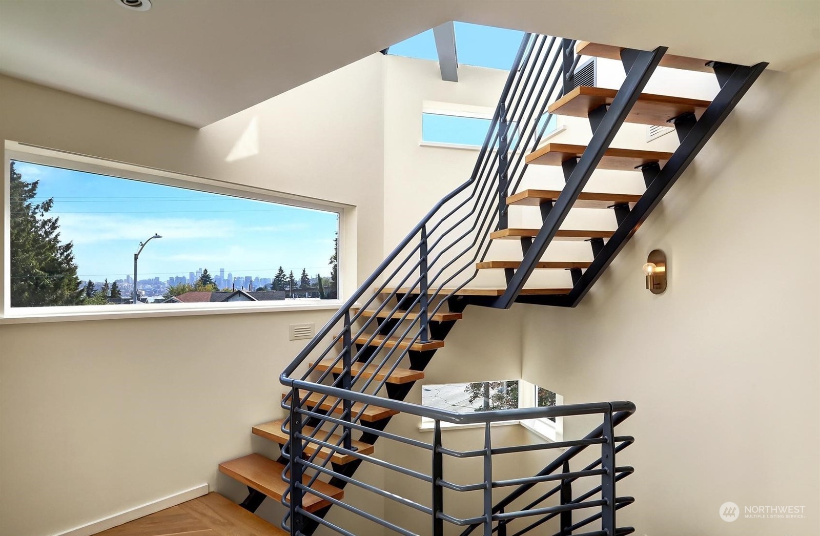 4606 Whitman Avenue North Seattle, WA 98103 - Photo 23 of 40 a view of entryway with wooden floor