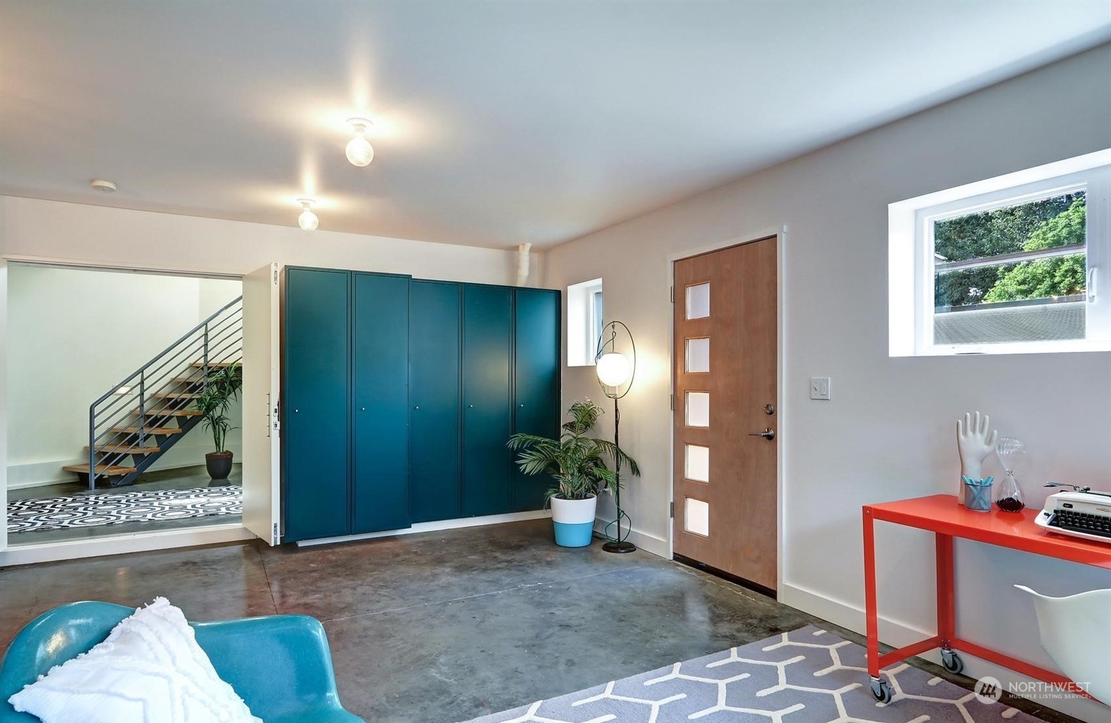 4606 Whitman Avenue North Seattle, WA 98103 - Photo 25 of 40 a view of a livingroom with furniture and toys