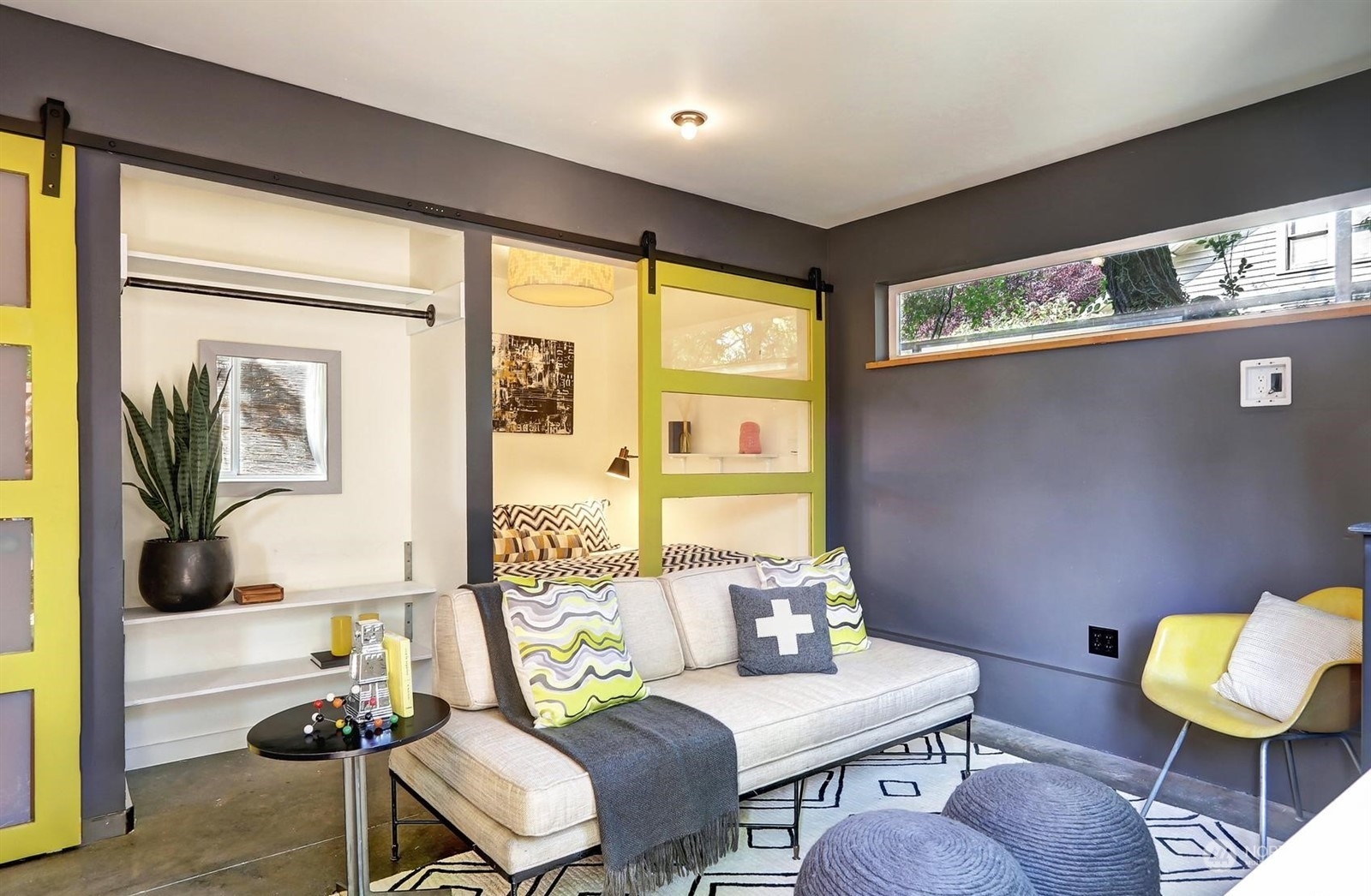 4606 Whitman Avenue North Seattle, WA 98103 - Photo 30 of 40 a living room with furniture and a large window