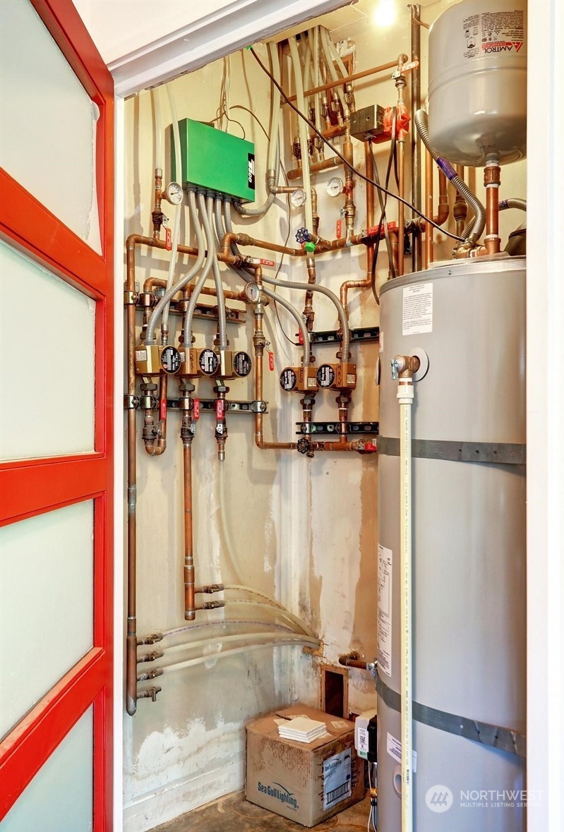 4606 Whitman Avenue North Seattle, WA 98103 - Photo 36 of 40 a room with storage and utility