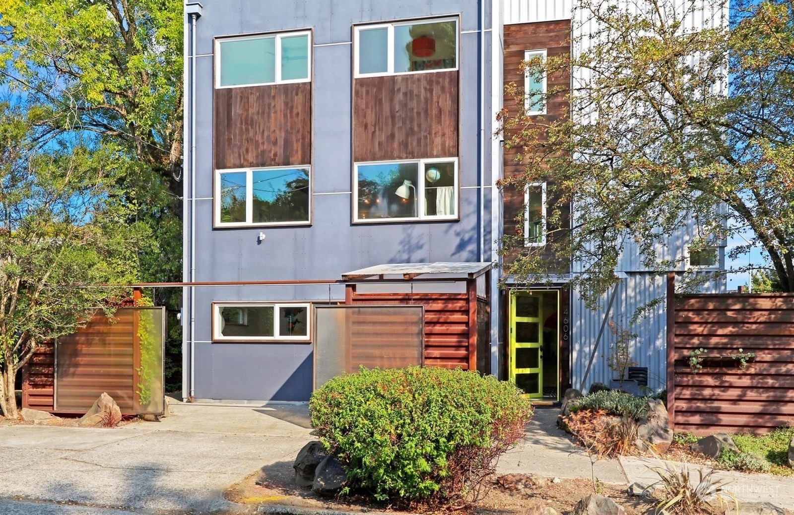 4606 Whitman Avenue North Seattle, WA 98103 - Photo 38 of 40 a front view of a house with a yard