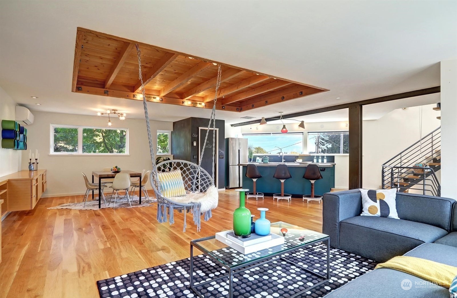 4606 Whitman Avenue North Seattle, WA 98103 - Photo 6 of 40 a living room with furniture and a large window