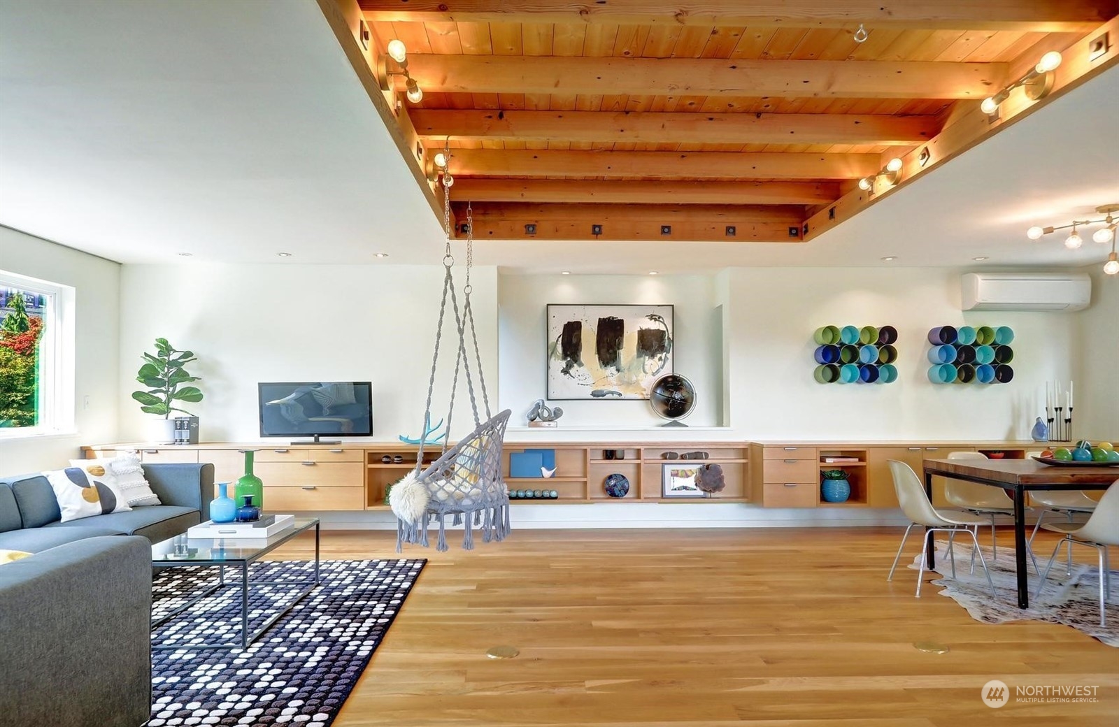 4606 Whitman Avenue North Seattle, WA 98103 - Photo 9 of 40 a living room with furniture and a rug