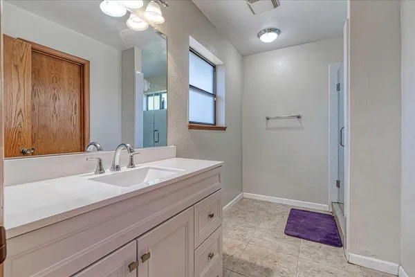 a bedroom with a bed and a closet