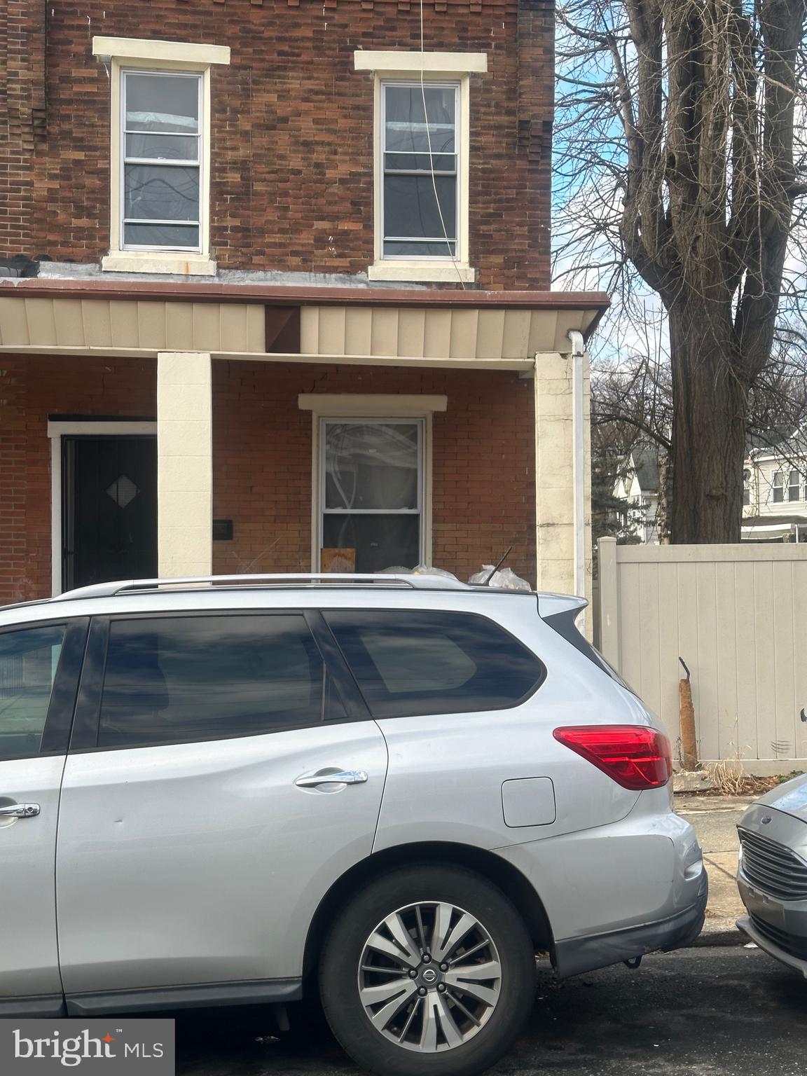 1018 North 66th Street Philadelphia, PA 19151 - Photo 2 of 6 a view of car parked in front of a house