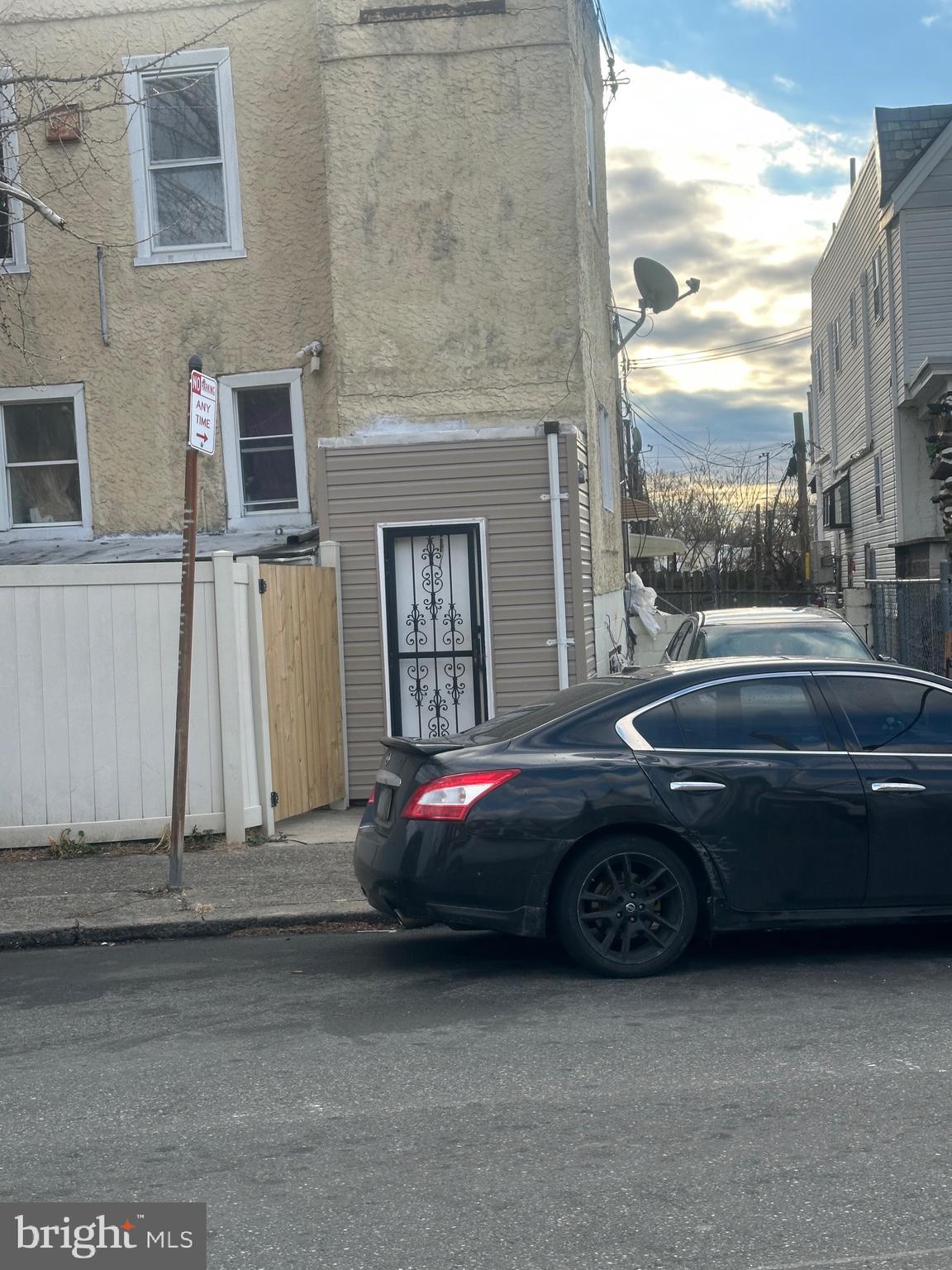 1018 North 66th Street Philadelphia, PA 19151 - Photo 5 of 6 a couple of cars parked in front of a building