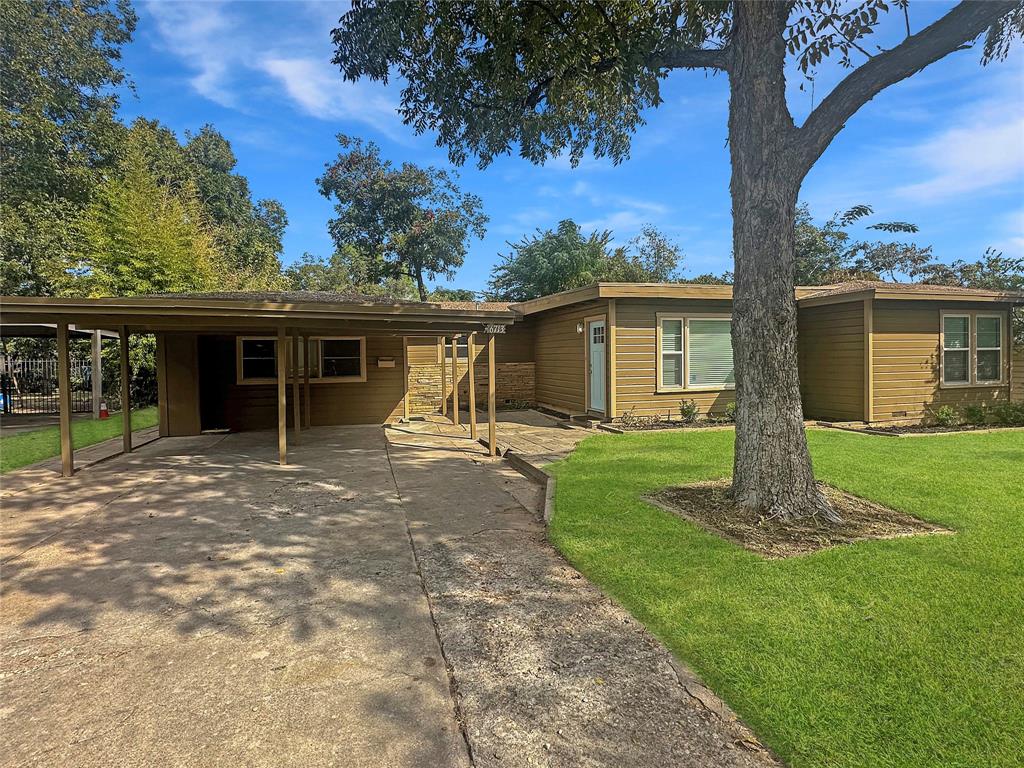 6713 Norma Street Fort Worth, TX 76112 - Photo 1 of 21 a front view of a house with a garden