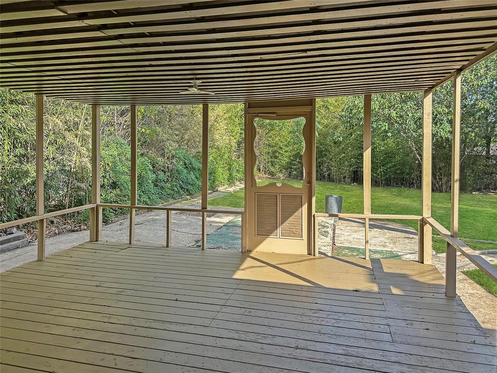 6713 Norma Street Fort Worth, TX 76112 - Photo 17 of 21 a view of a room with wooden floor and windows