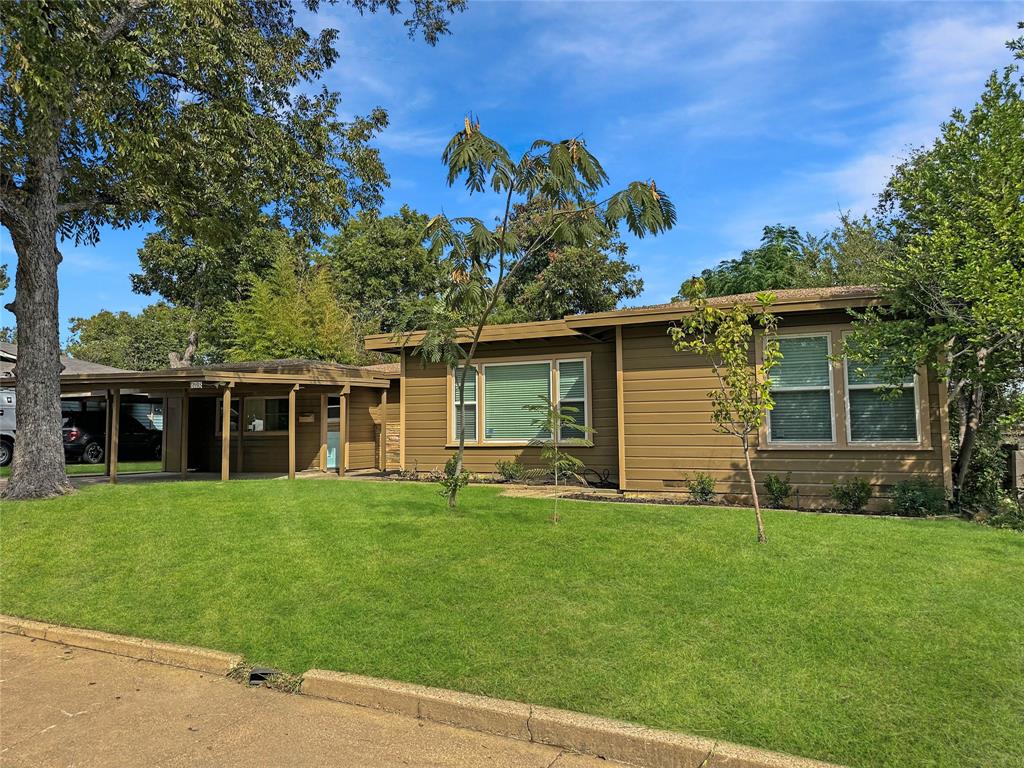 6713 Norma Street Fort Worth, TX 76112 - Photo 21 of 21 front view of a house with a yard