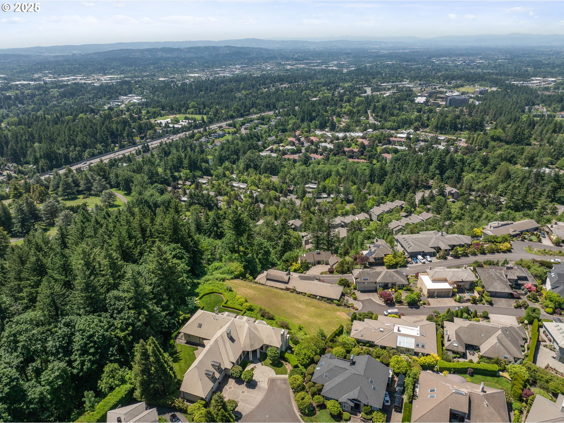 Ascot Court Portland, OR 97225 - Photo 2 of 12 an aerial view of a city with lots of residential buildings