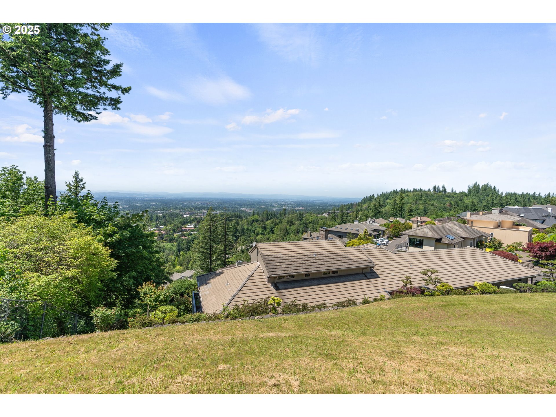 Ascot Court Portland, OR 97225 - Photo 4 of 12 a view of a lake with a big yard