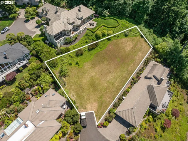 an aerial view of residential house with outdoor space