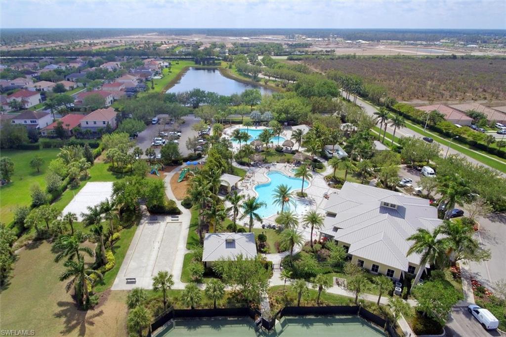 2106 Clementine Street Naples, FL 34120 - Photo 30 of 34 an aerial view of a city with lots of residential buildings