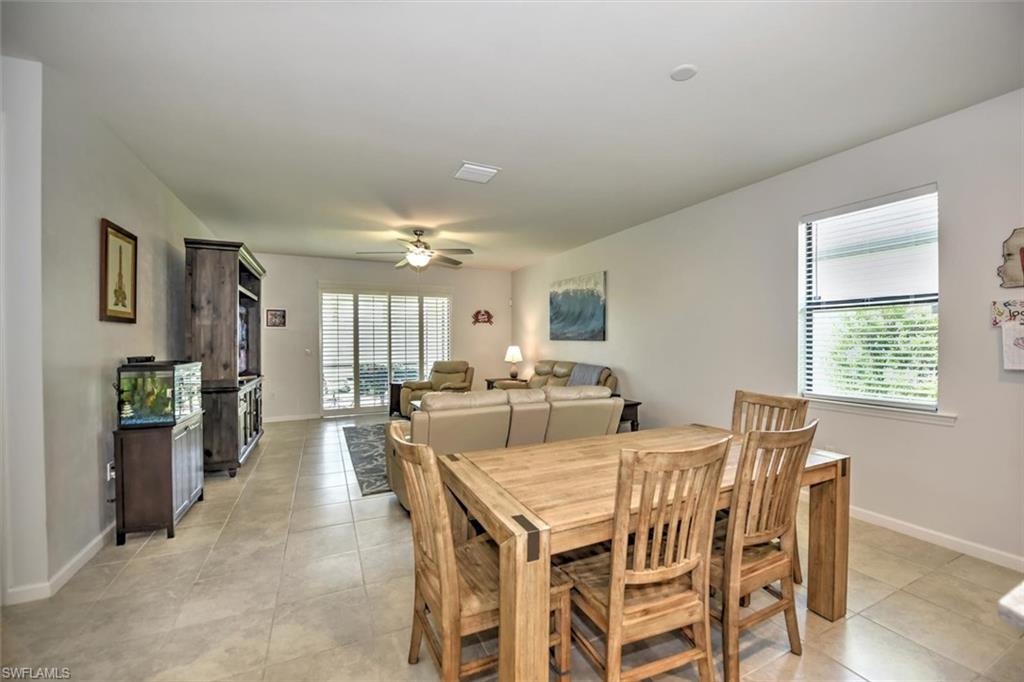 2106 Clementine Street Naples, FL 34120 - Photo 7 of 34 a view of a dining room with furniture