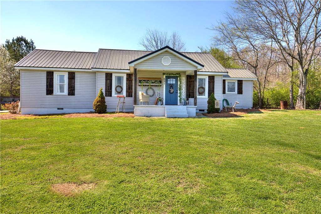 691 Clarkwood Road Rockmart, GA 30153 - Photo 1 of 1 a front view of a house with a yard