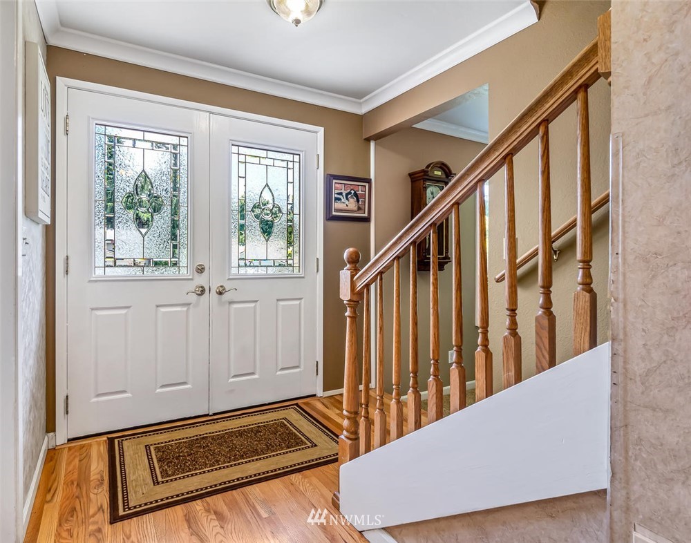 11812 Northeast 157th Street Bothell, WA 98011 - Photo 2 of 25 a view of a hallway with an entryway